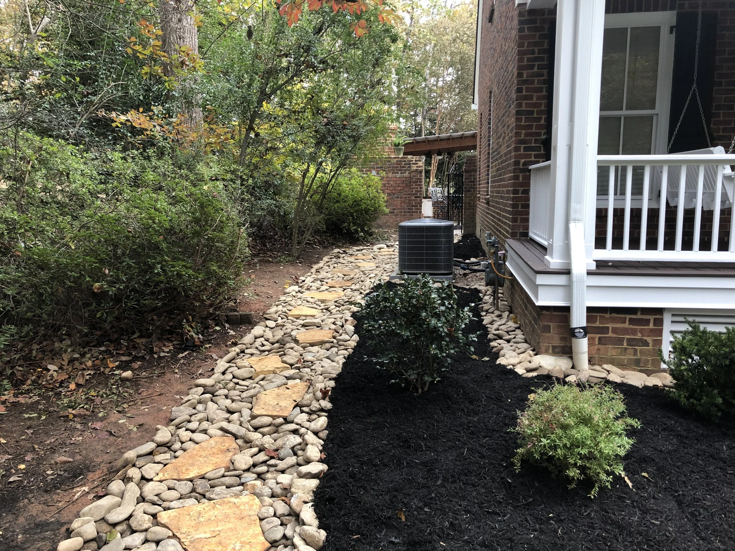 River rock & slate is always great for a pathway!