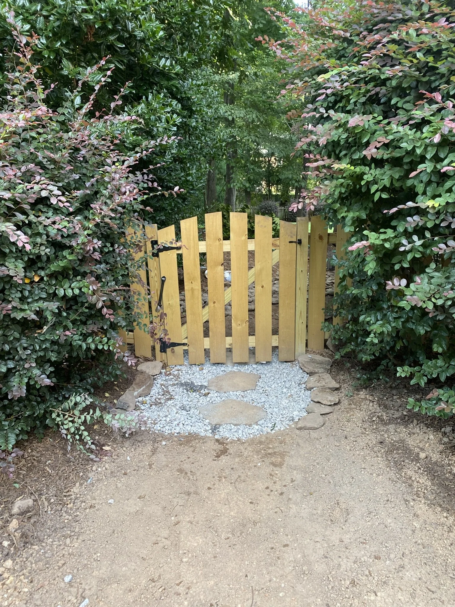 Love the aesthetic of this gate & path. Also, it's secretly part of a custom drainage system!