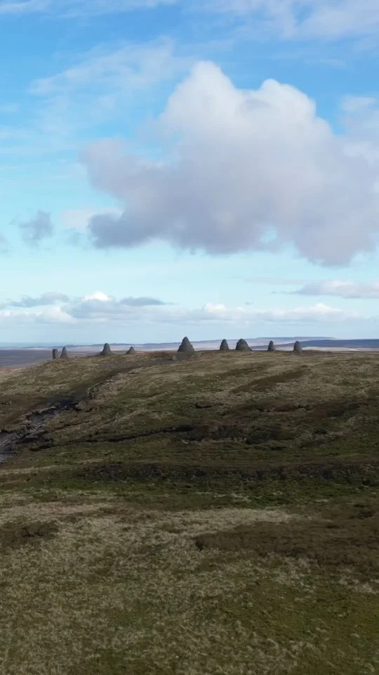 Nine Standards Rigg sits just on the edge of the Yorkshire Dales National Park and a landmark point of the Coast to Coast. The age of the nine cairns remains a mystery but we know they are at least several hundreds of years old at least but could be