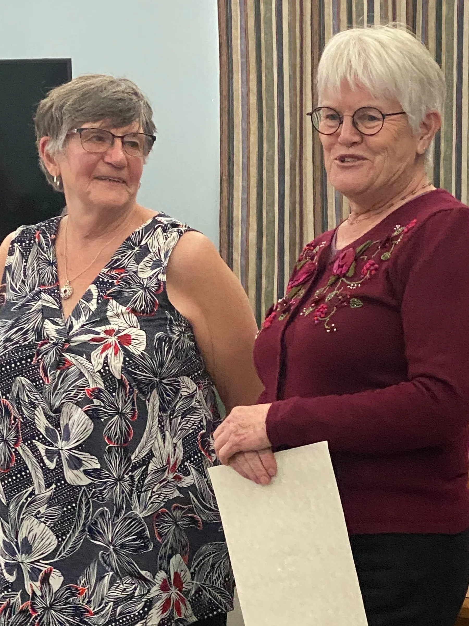 Joan Yamamoto receiving a Recognition Award at the 2024 AGM for her extraordinary fund-raising efforts for Hospice