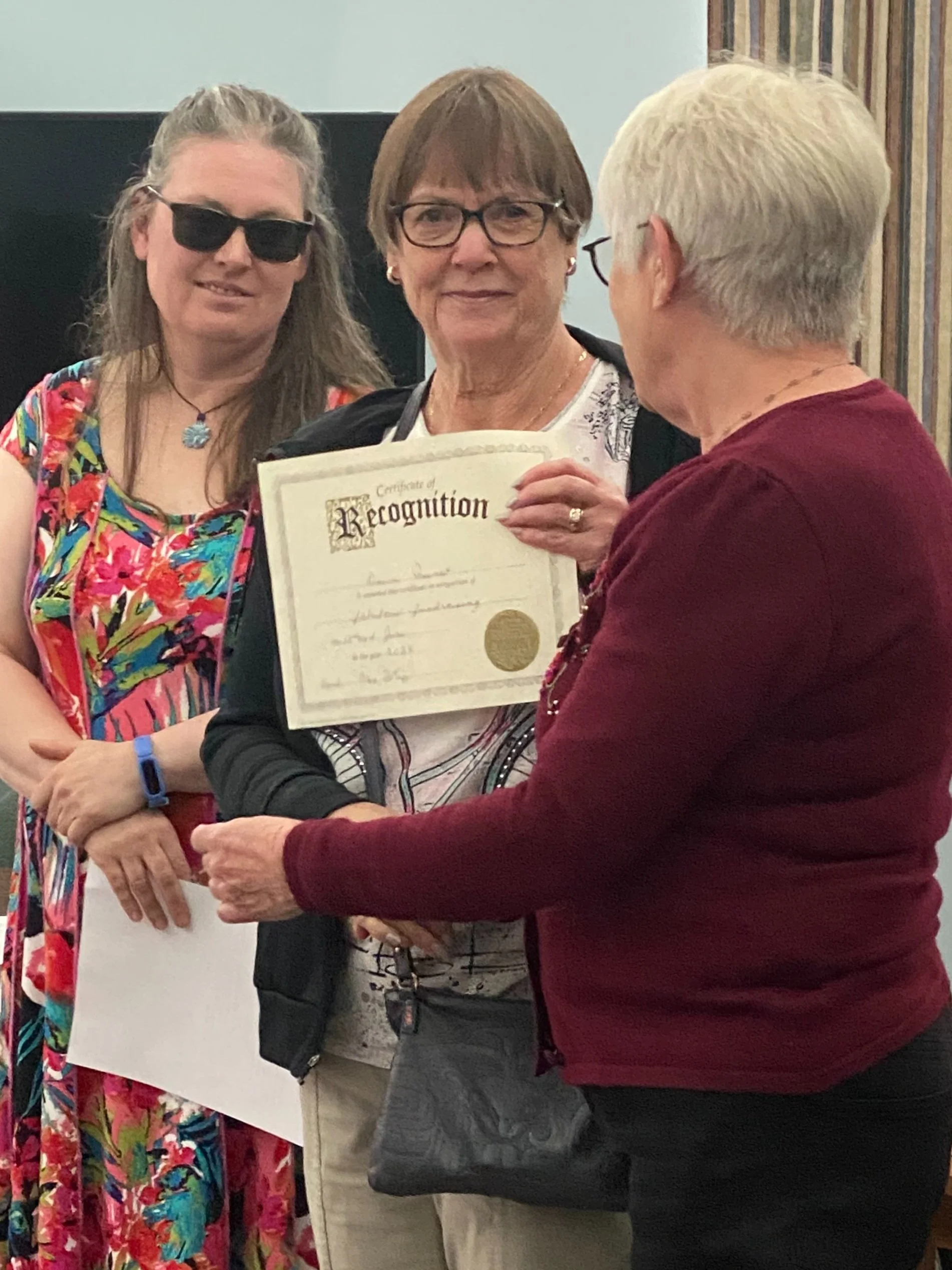Dawn Quast receiving a Recognition Award at the 2024 AGM for her extraordinary fund-raising efforts for Hospice