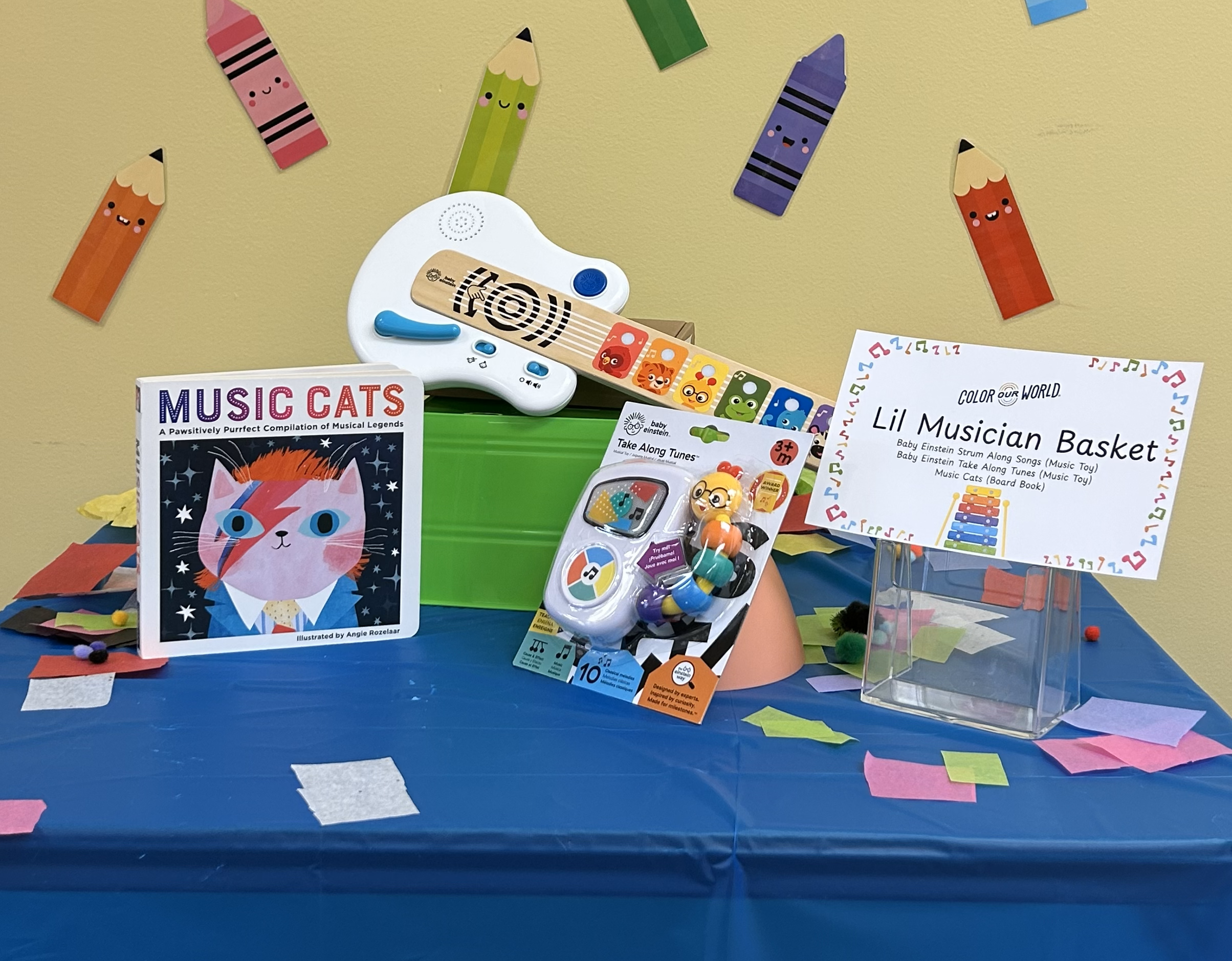Lil Musician Basket- Baby Einstein Strum Along Guitar, Baby Einstein Take Along Tunes, and Music Cats Board book