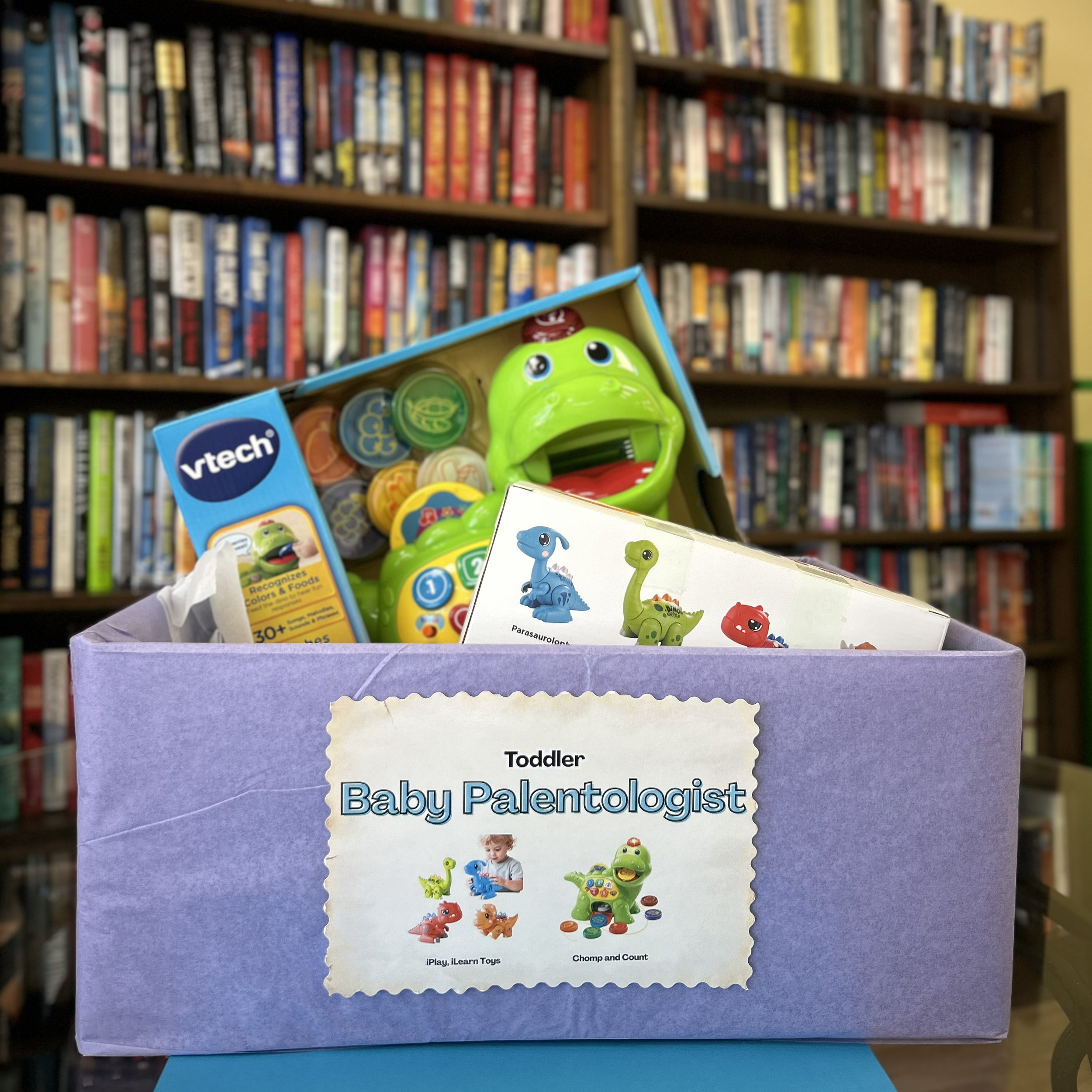 Baby Paleontologist bundle includes chomp and count dinosaur toy, and iPlay iLearn dinosaur assmebly toy