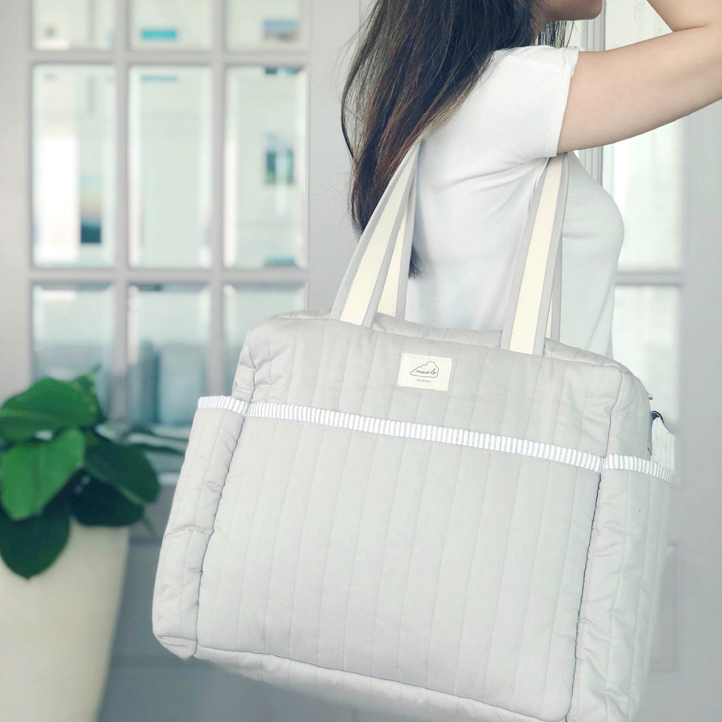 7_Masilo_Diaper-Bag_Moodshot_Grey.jpg