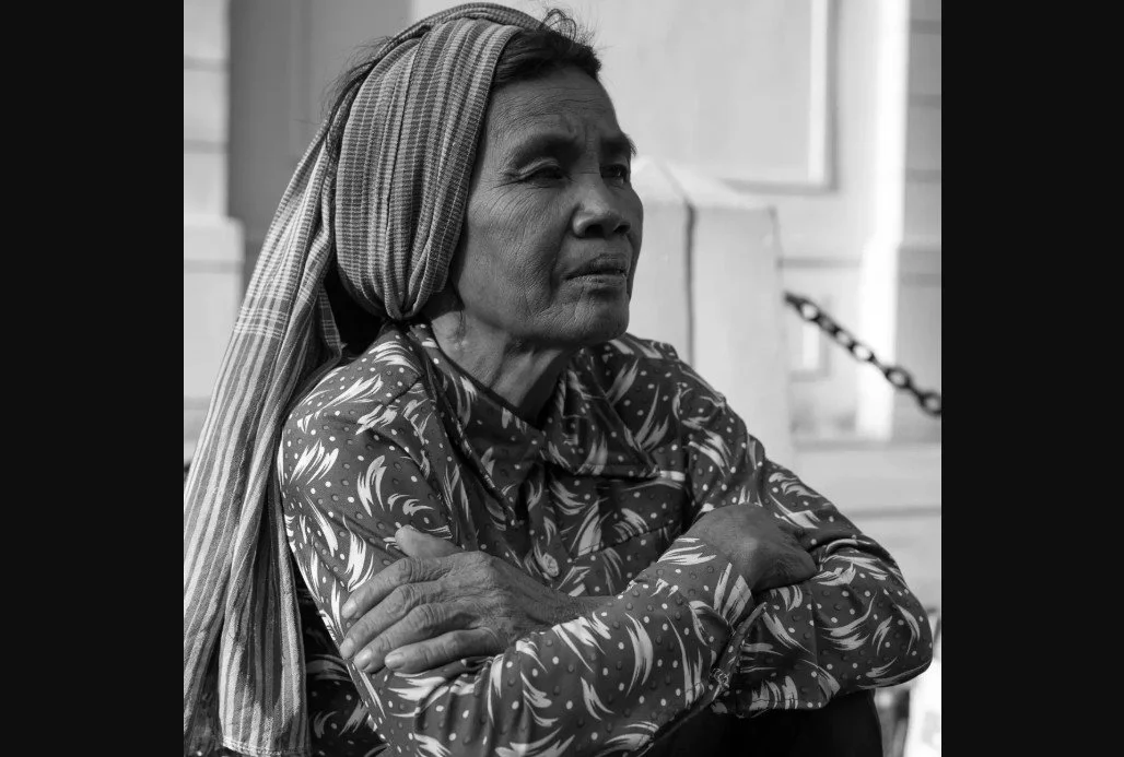 Black-and-white street portrait by Richard Evnen, from his featured portfolio on All About Photo