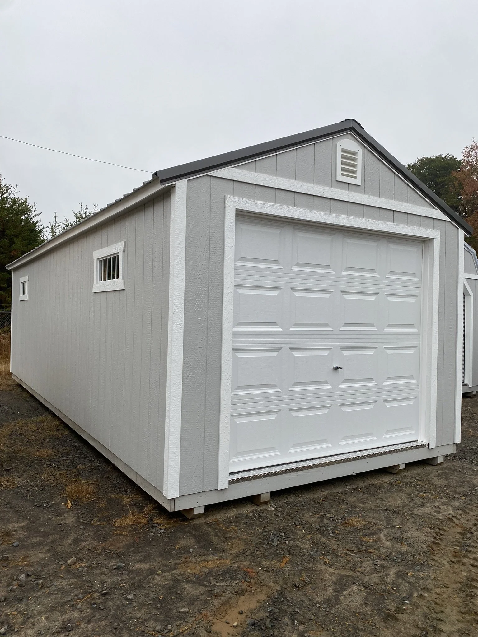 alpine shed garage with garage door.jpeg