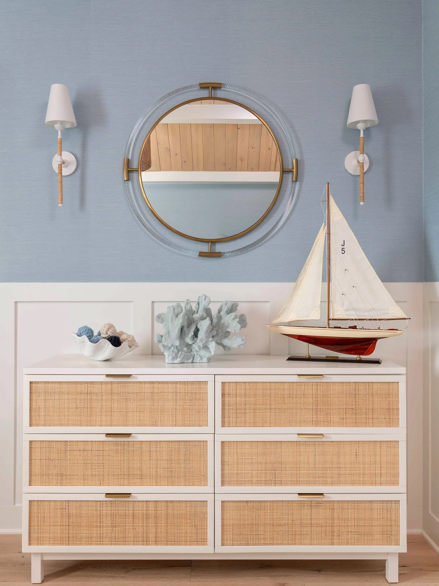 ⚓️ Anchors Aweigh, Baby Christian! 🐋

We are sharing just a few sweet (sneak peek) shots of the coastal-inspired nursery we designed, featuring so many beautiful details like a soft blue grasscloth wallpaper, crisp white board and batten &amp; layer