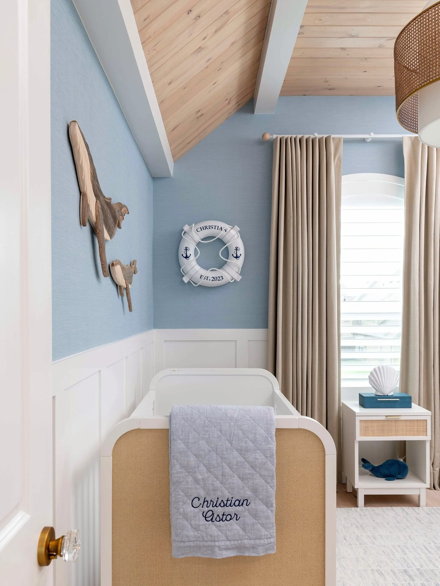 Sharing a little more of this cutie patootie&rsquo;s Nautical Nursery! ⚓️🛟🐋💙

This room started as a blank slate! Completely empty! 
No board &amp; batten, no wallpaper, no paint&hellip; just plain white walls, a sheetrock ceiling, and new wood fl