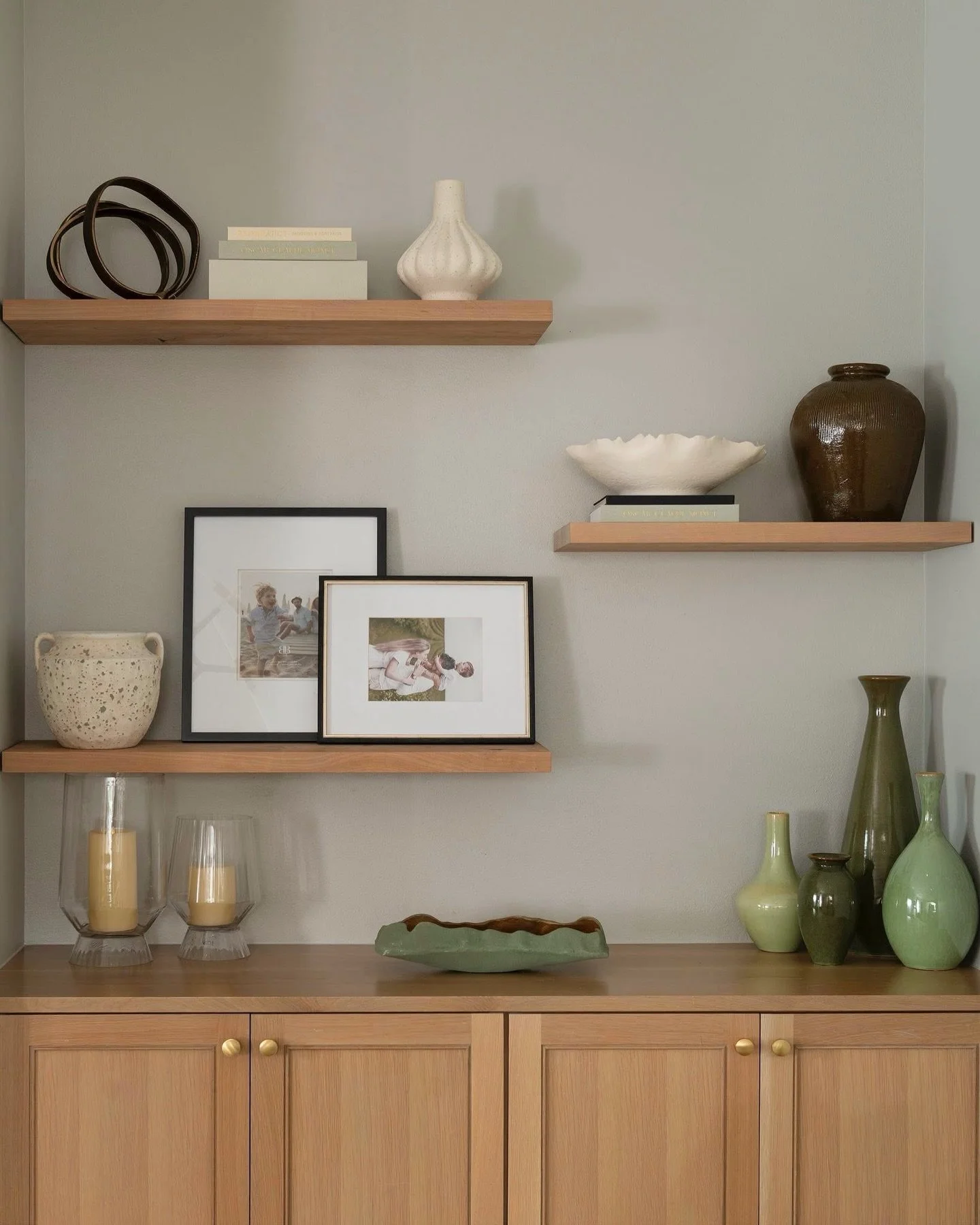 The magic is ALWAYS in the personalization! ✨

Layered family photo frames, collected vessels, natural wood custom shelves, meaningful color coordinated pieces come together to create warmth, balance &amp; character to YOUR  story! 

It&rsquo;s these