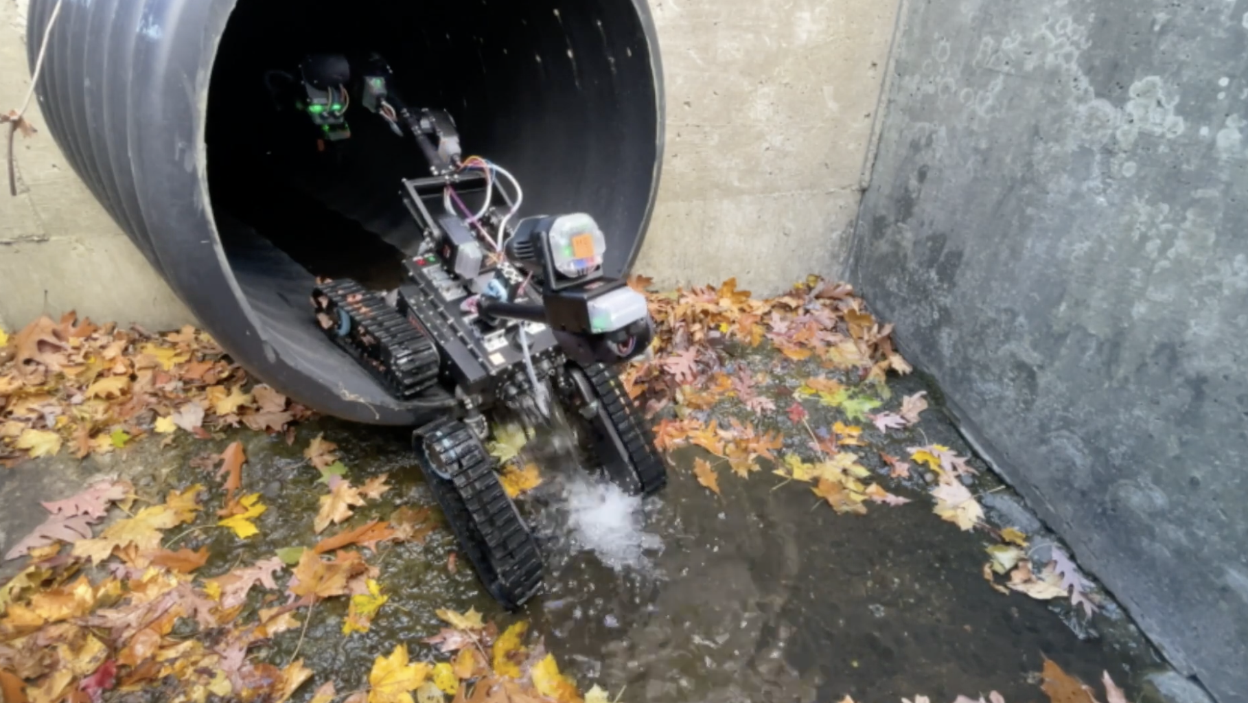 HEBI's Treadward robot climbing into a pipe for inspection work