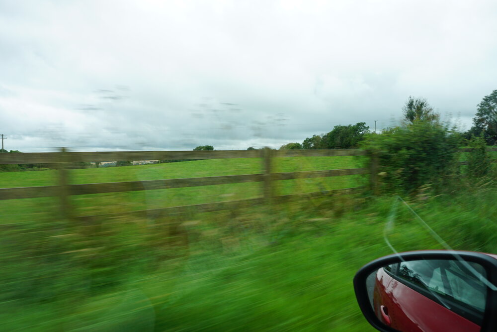 Driving through the green Irish countryside