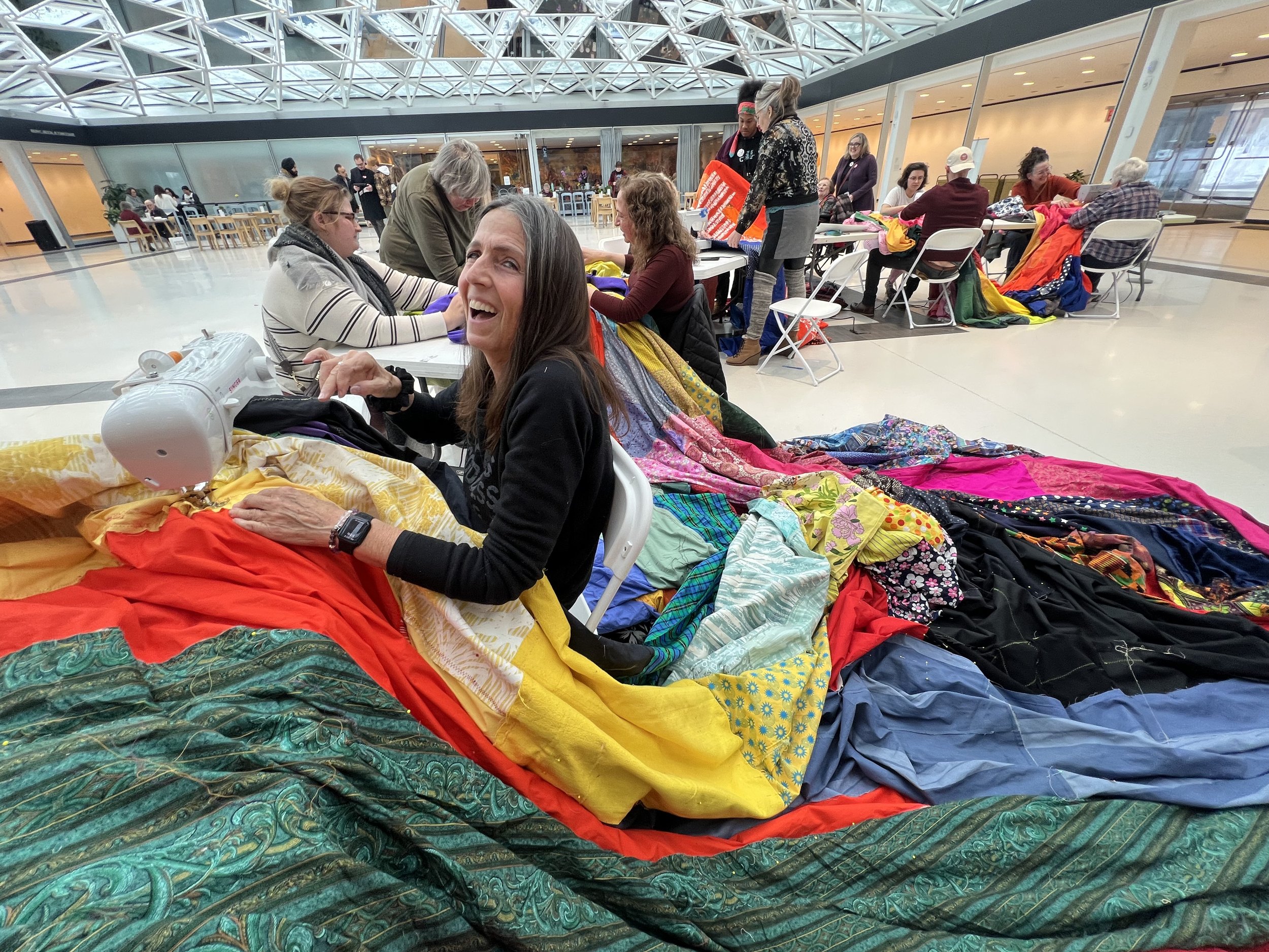 Public Sewing Days for Night Rainbow (2025) - Amanda Browder: Located at the Buffalo Art Museum AKG: part of the AKPublic Art Initiative exhibition Hi-Vis. All fabric is donated and built with the support and labor of the citizens of Buffalo, NY.