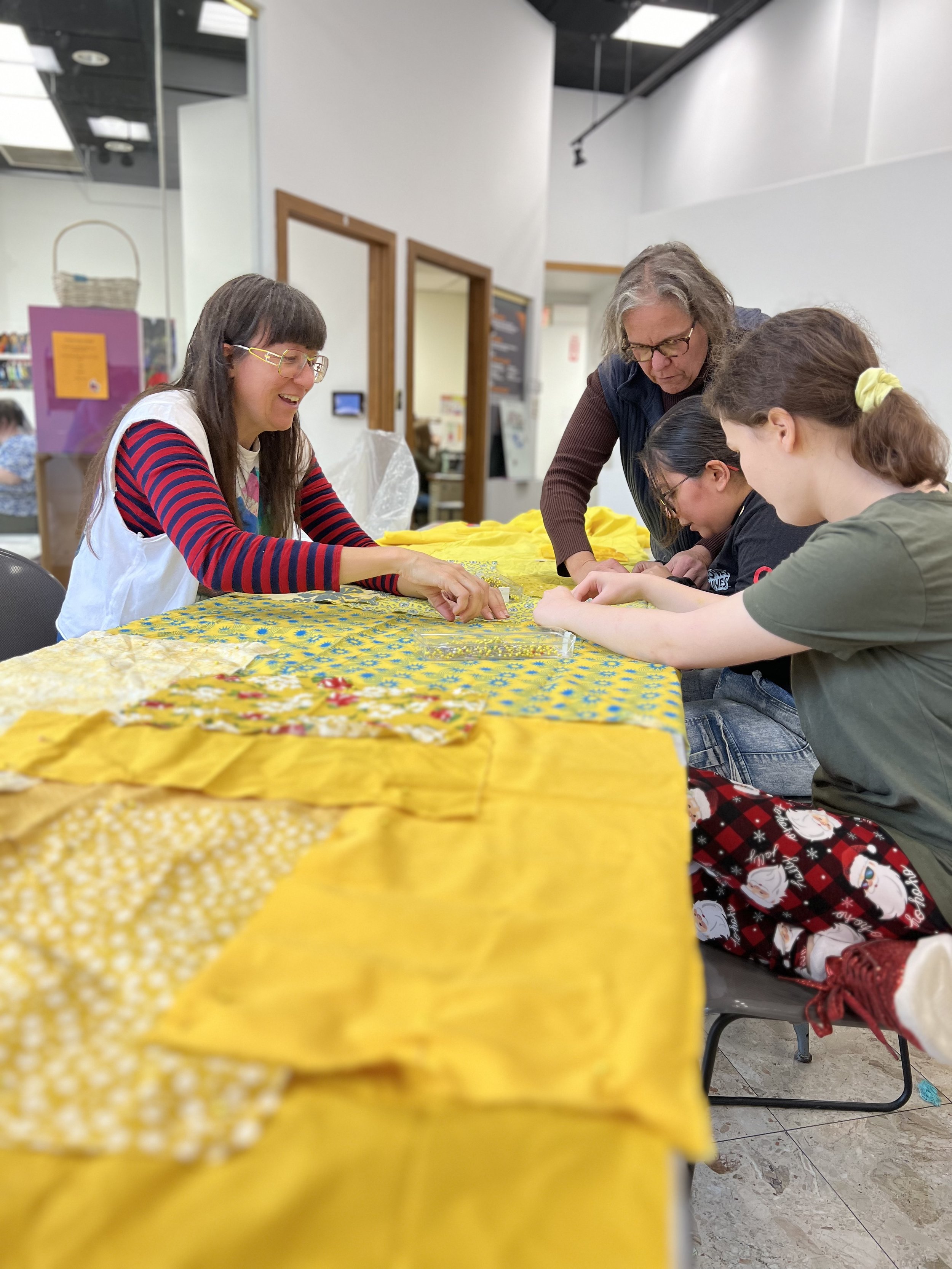 Public Sewing Days for Night Rainbow (2025) - Amanda Browder: Located at the Buffalo Art Museum AKG: part of the AKPublic Art Initiative exhibition Hi-Vis. All fabric is donated and built with the support and labor of the citizens of Buffalo, NY. Loc
