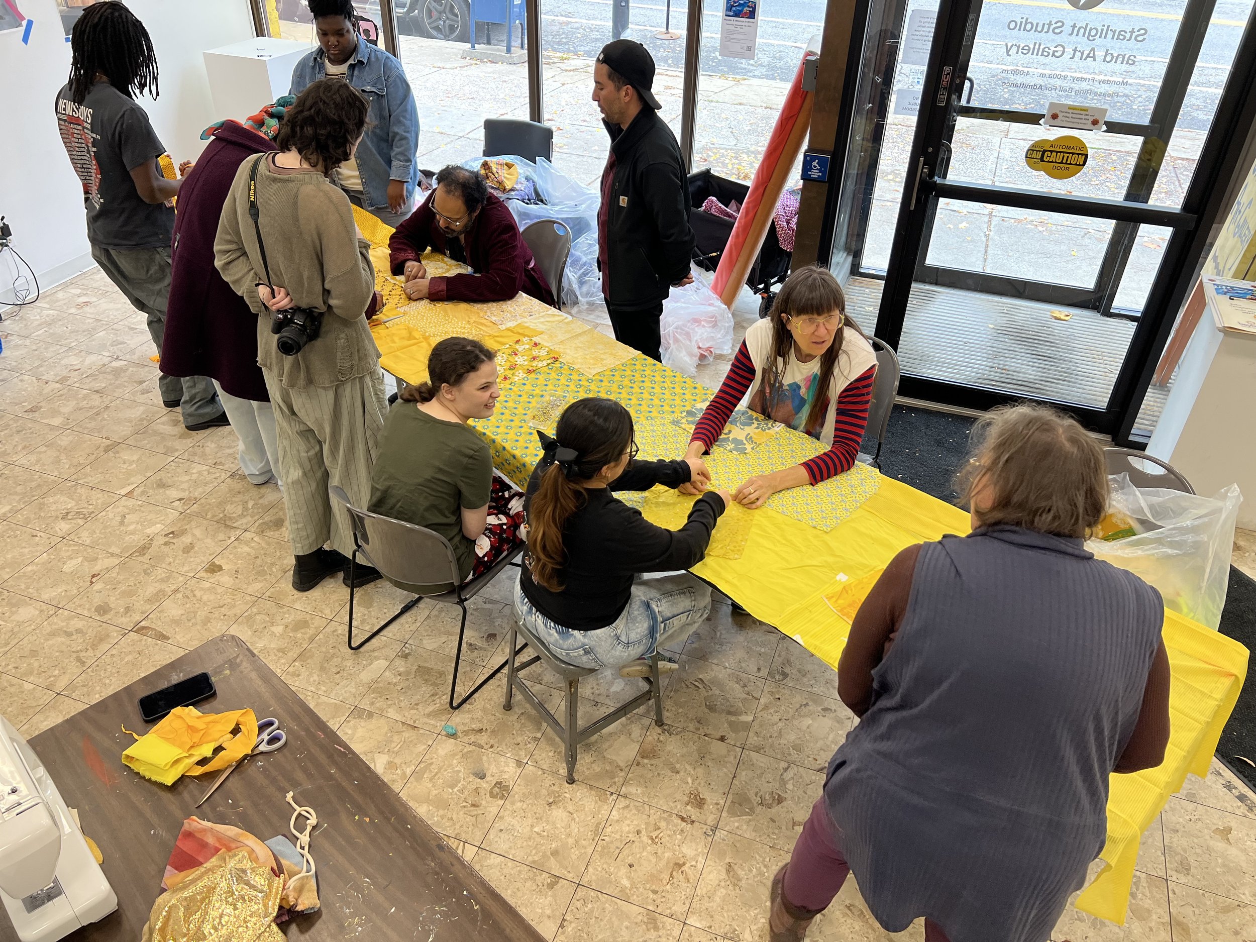 Public Sewing Days for Night Rainbow (2025) - Amanda Browder: Located at the Buffalo Art Museum AKG: part of the AKPublic Art Initiative exhibition Hi-Vis. All fabric is donated and built with the support and labor of the citizens of Buffalo, NY. Loc