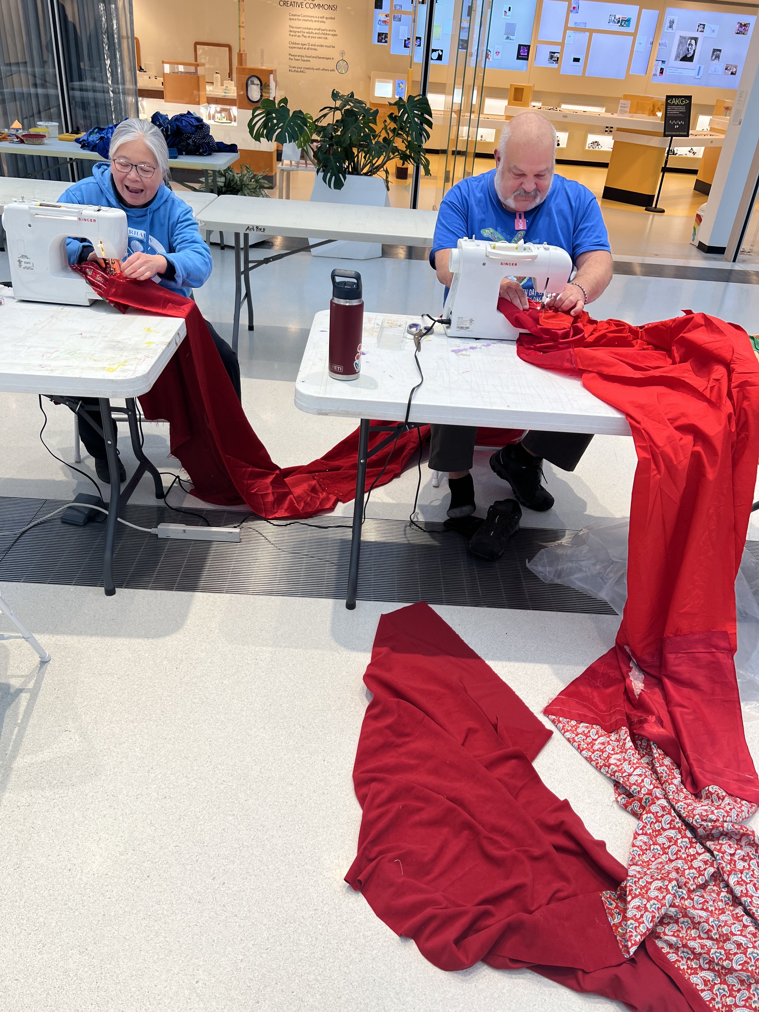 Public Sewing Days for Night Rainbow (2025) - Amanda Browder: Located at the Buffalo Art Museum AKG: part of the AKPublic Art Initiative exhibition Hi-Vis. All fabric is donated and built with the support and labor of the citizens of Buffalo, NY.