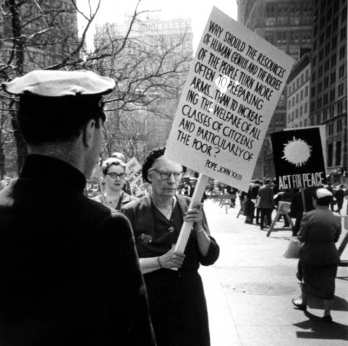  “Dorothy Day at City Hall” where she was arrested for protesting the mandatory “Operation Alert” civil defense drill (April 17, 1959). Photo by  Felton Davis  is licensed under CC BY 2.0. 