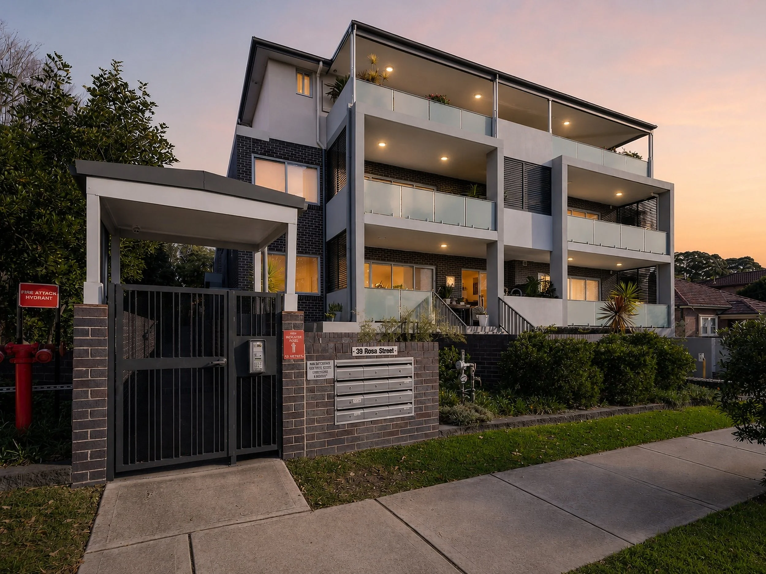 modern_building_with_landscaped_entrance_at_dusk_print_high_res.jpg