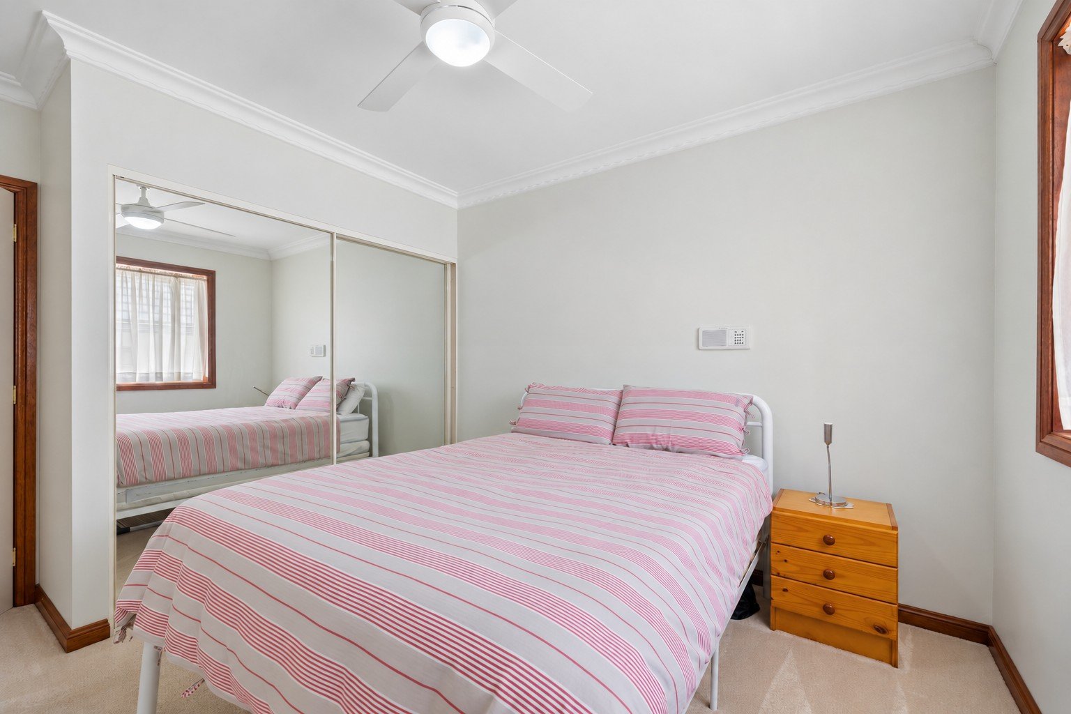 Minimal Pink-Striped Bedroom Interior.jpg