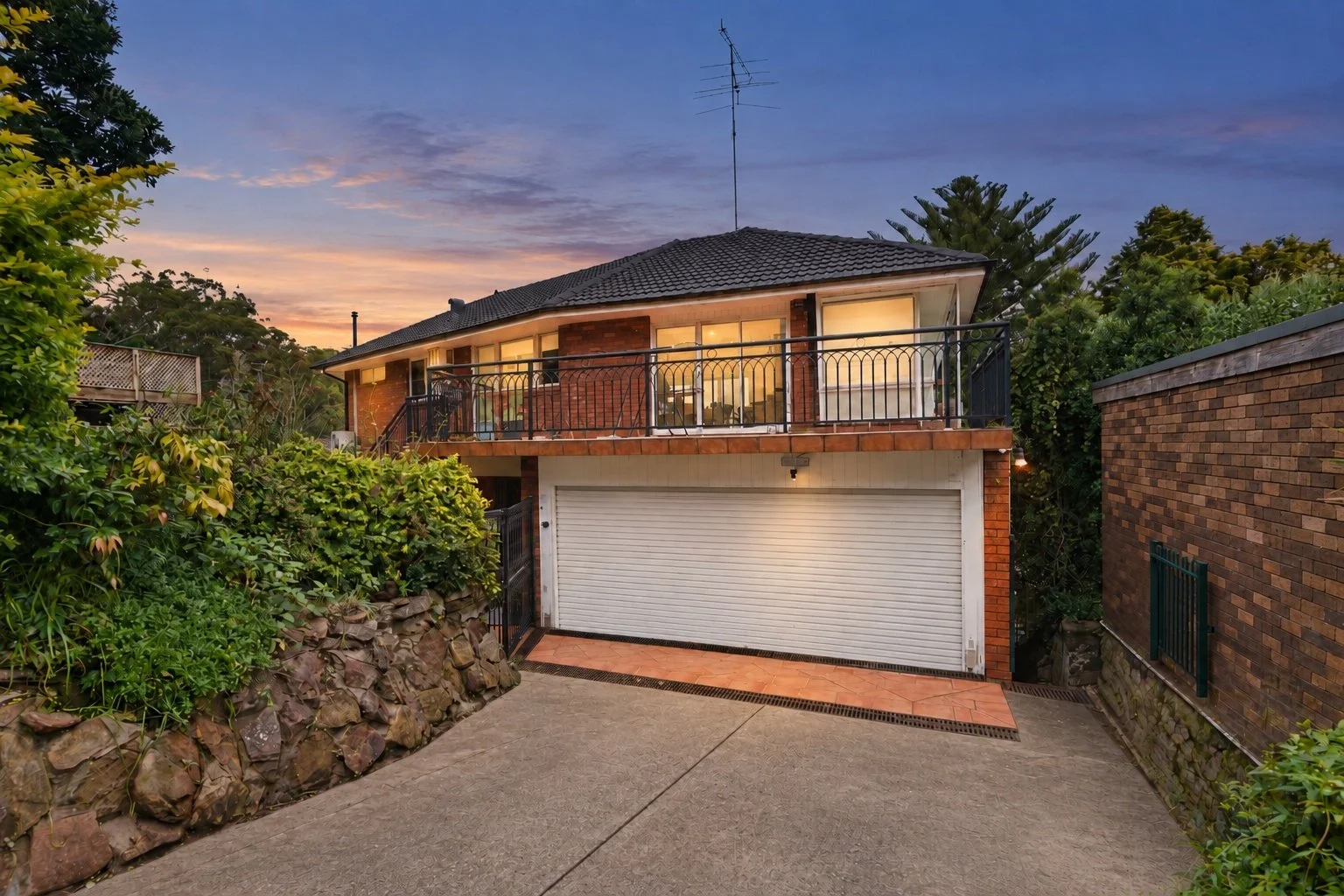 twilight_glow_over_suburban_brick_home.jpg