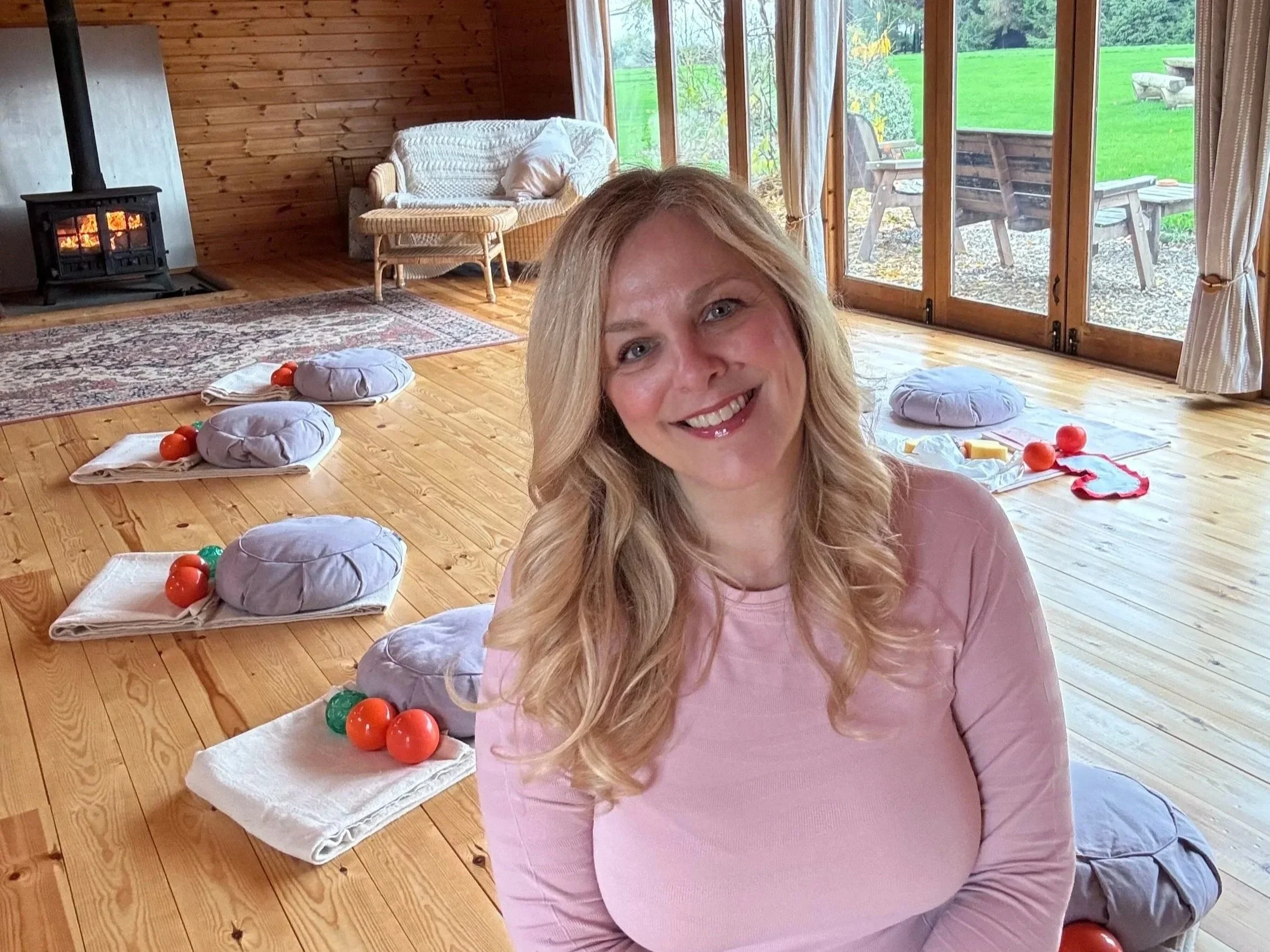 Relaxing in the Newton Meadows Garden Rooms retreat space, ready for polyvagal-informed somatic movement in Shrewsbury, Shropshire.