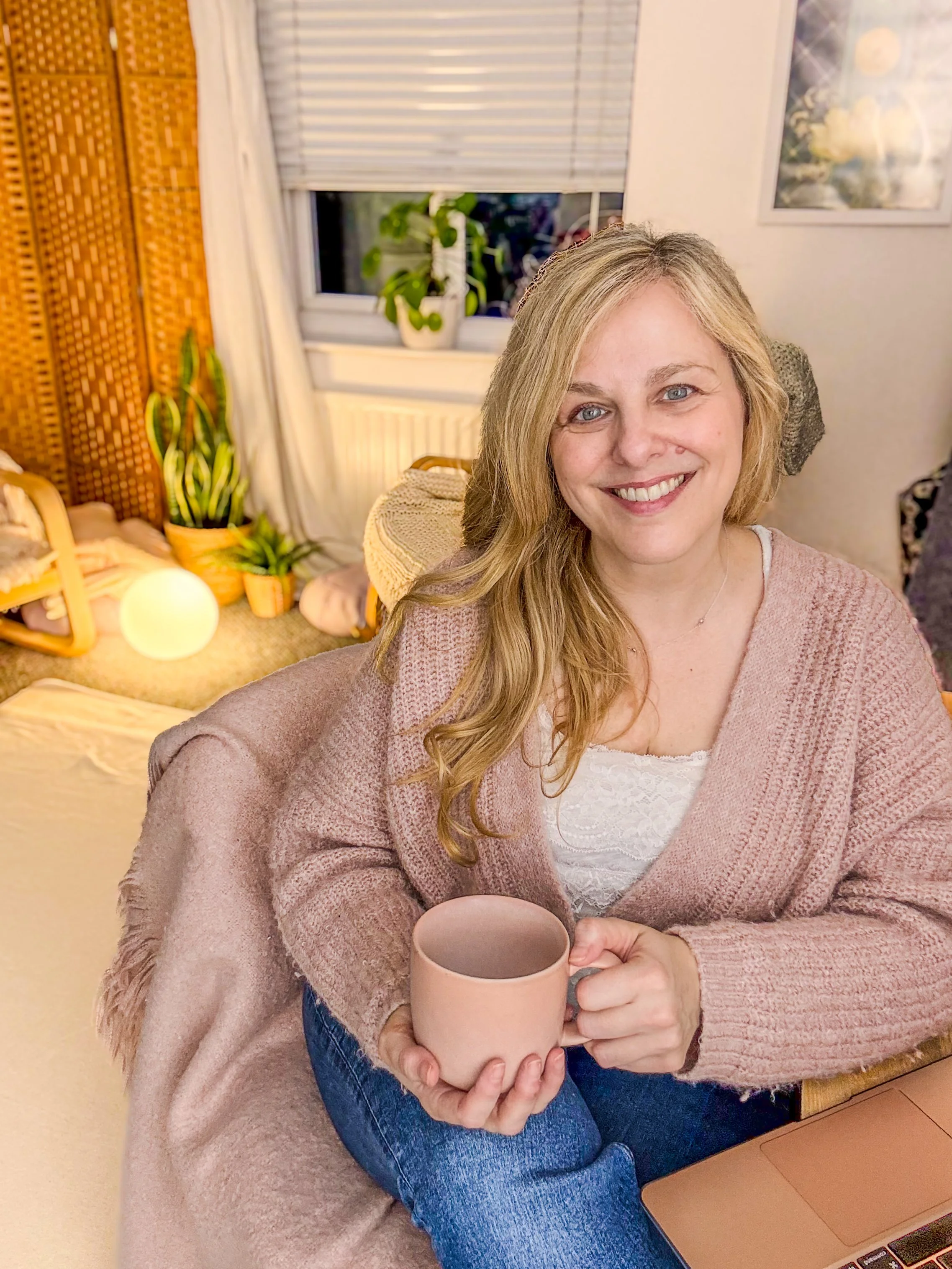 Inside Sarah Pritchard's somatic therapy space in Shrewsbury, featuring calm lighting and ergonomic seating for 1:1 sessions.