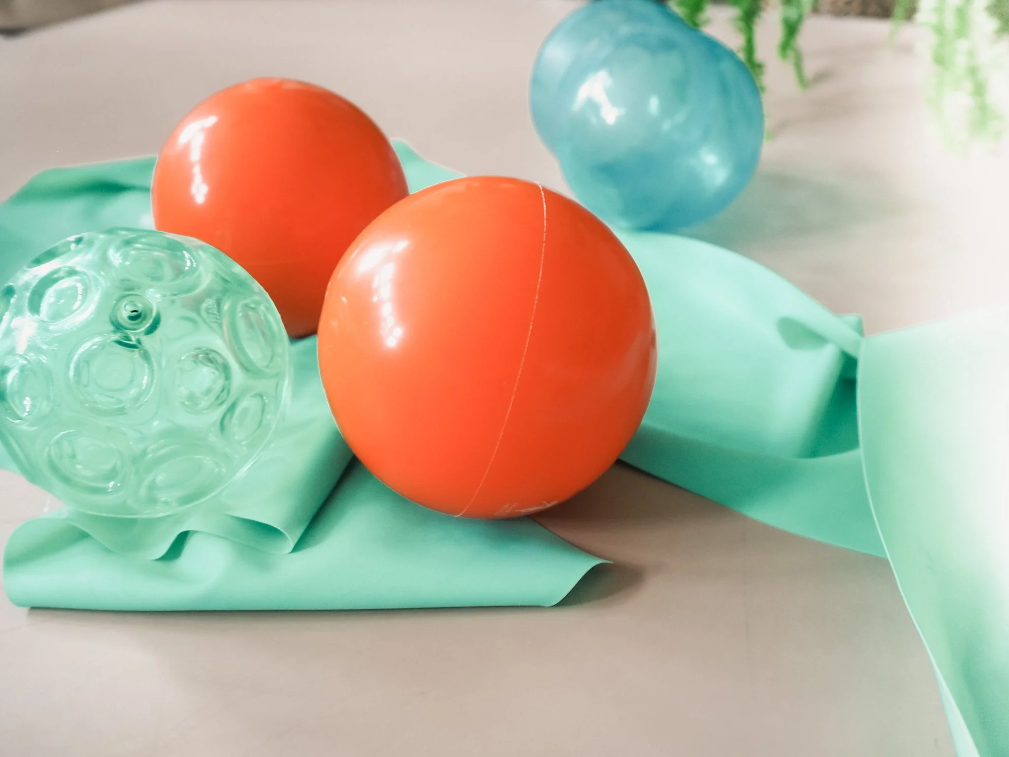 Textured Franklin Method fascia balls used for myofascial tension release and nervous system grounding at Cool Pilates Birmingham.