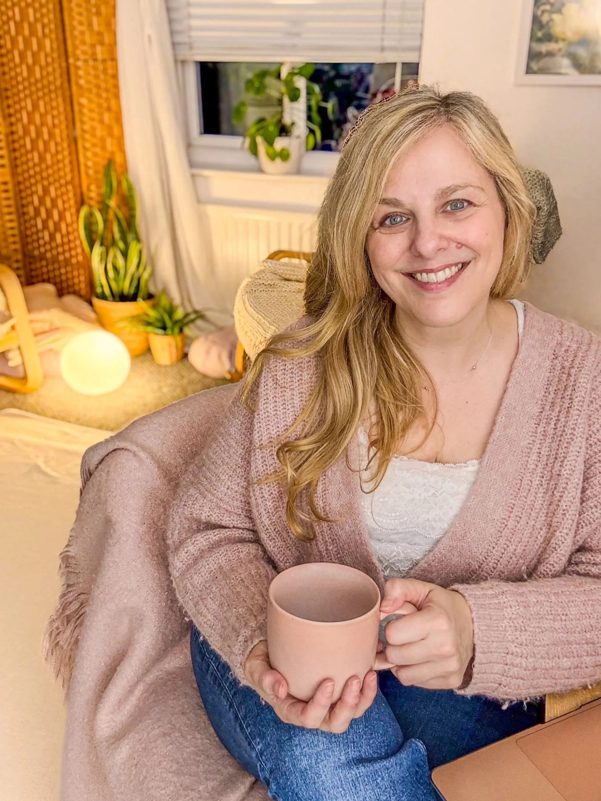 Inside Sarah Pritchard's somatic therapy space in Shrewsbury, featuring calm lighting and ergonomic seating for 1:1 sessions.