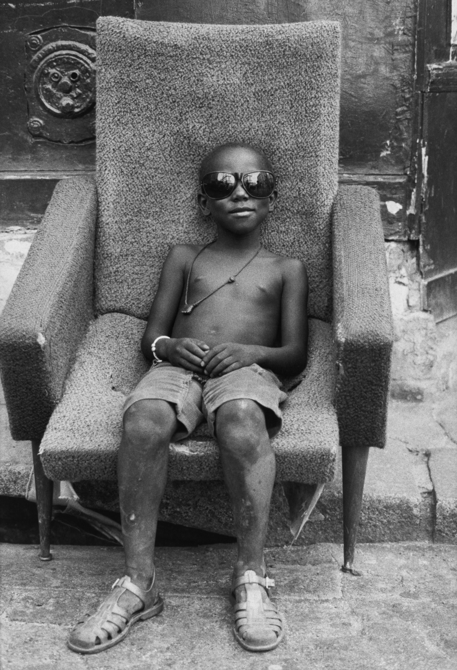 Mamadou picked out his armchair on Polonceau Street, La Goutte d’Or, 1982