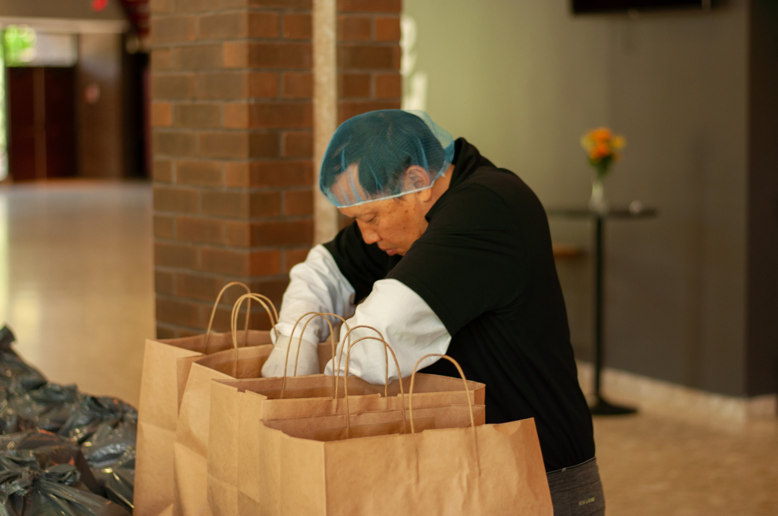 Image of man packing food