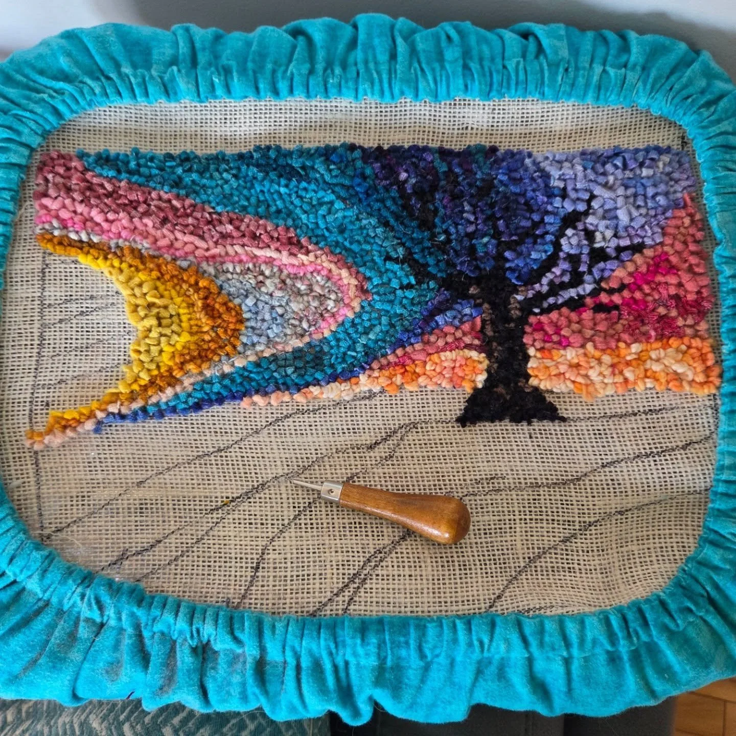My latest "me" project. I have tried rug hooking a few times, and a friend lent me this lap frame to try. I love it! I will have to get one.

Original design, on burlap. I should have made the colours around the tree a little lighter, but o