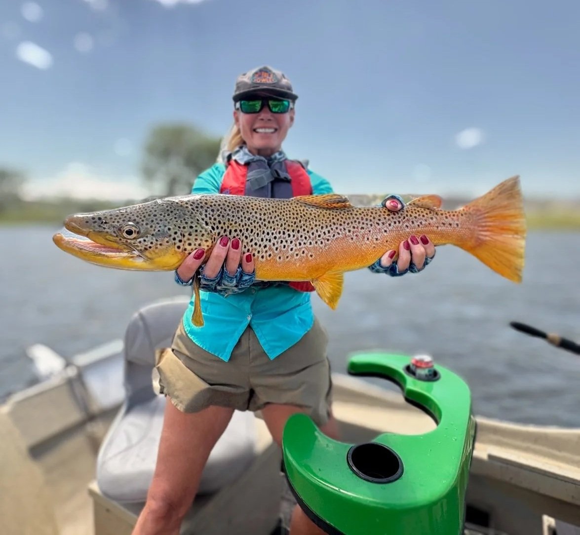 woman fly fishing colorado