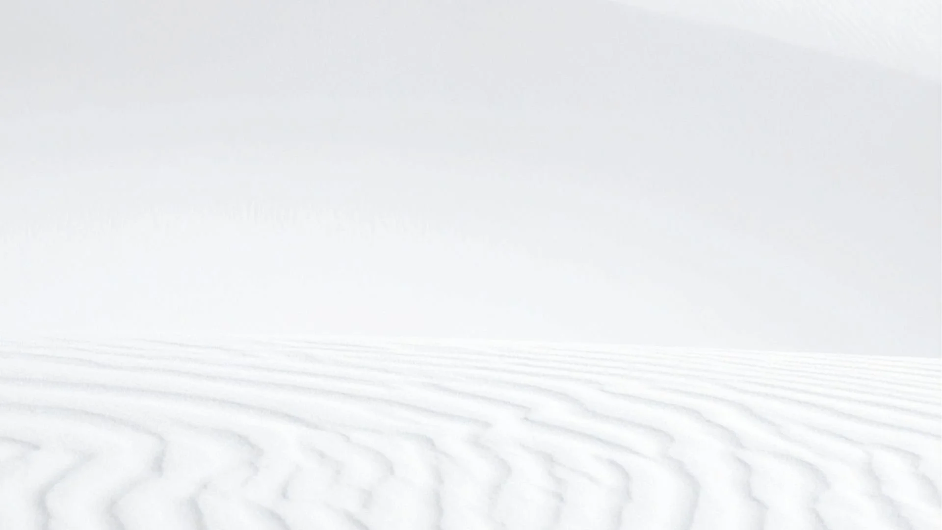 Minimal, light-toned abstract background used behind homepage content