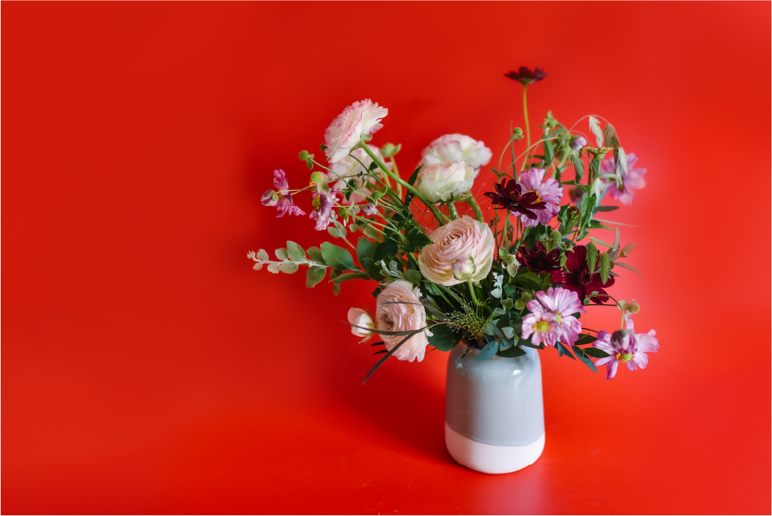 Friends and Lovers Photography Image of Flowers in Vase on Red Background