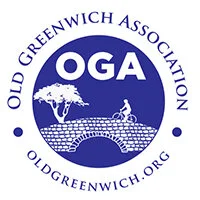 Logo of the Old Greenwich Association featuring a circular design with a tree, a bridge, and a person riding a bicycle, and the text 'OLD GREENWICH ASSOCIATION' and 'OLDGREENWICH.ORG'.