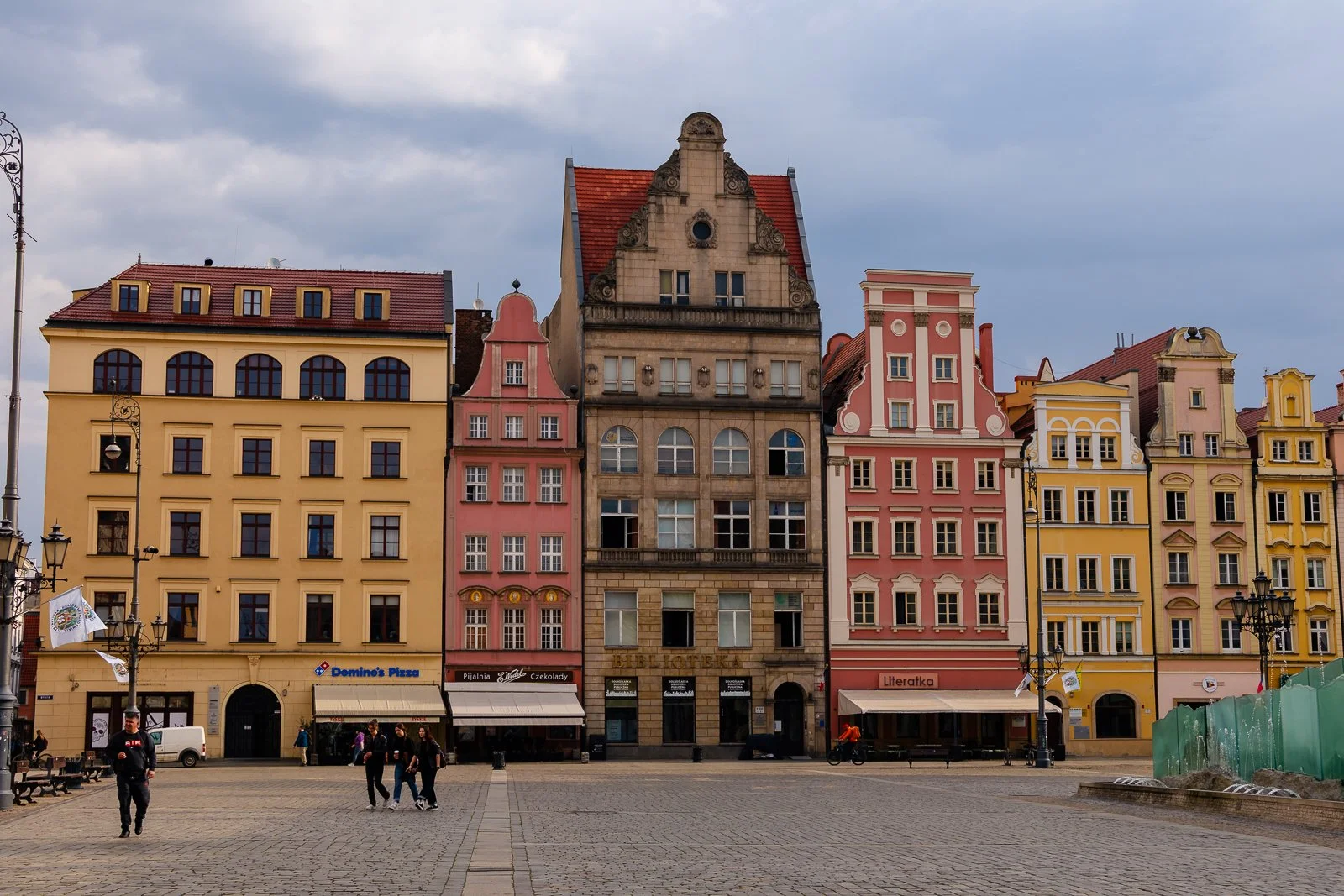 Colorful historic townhouse in Wroclaw market square, one of Europe's largest medieval squares.