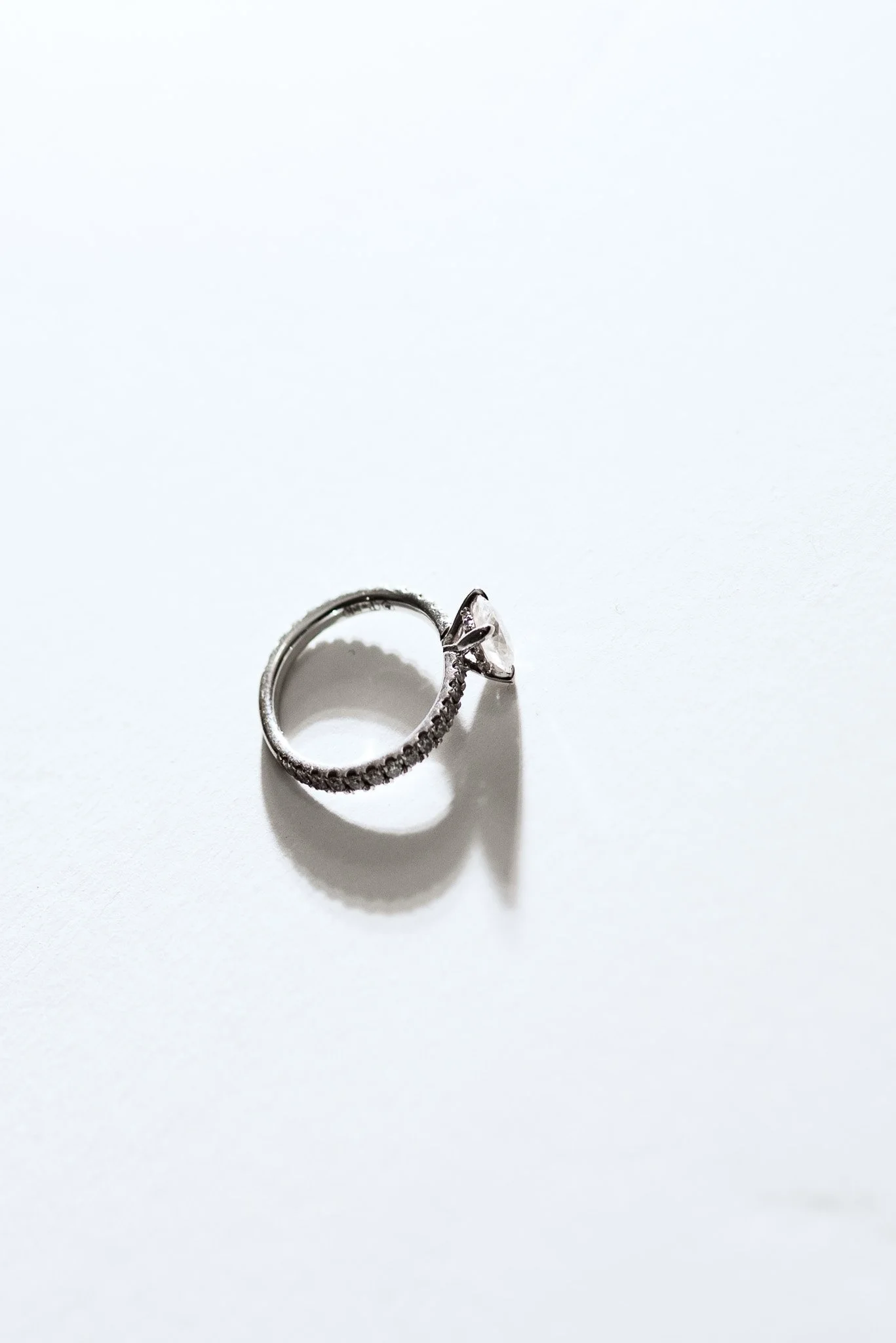 Wedding Ring, White Backdrop, Strong Shadow, B&W