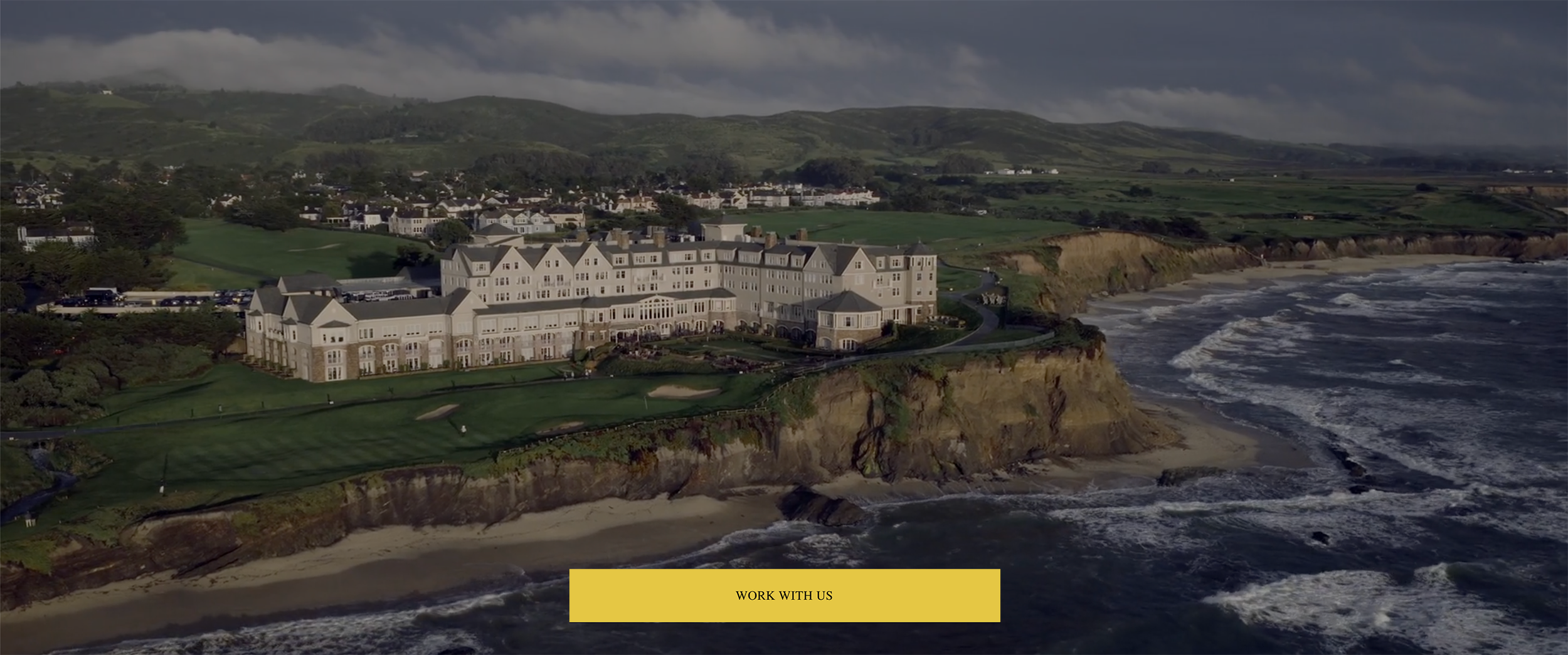 Screenshot of 26rogues.com homepage with aerial drone shot of Hearst Castle and ocean along the California coast
