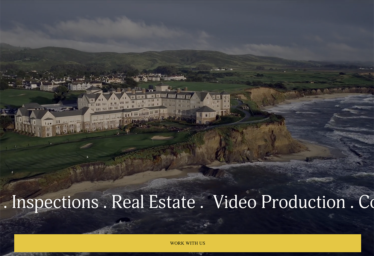 Website still from 26rogues.com, featuring large hotel estate along the Pacific Coast