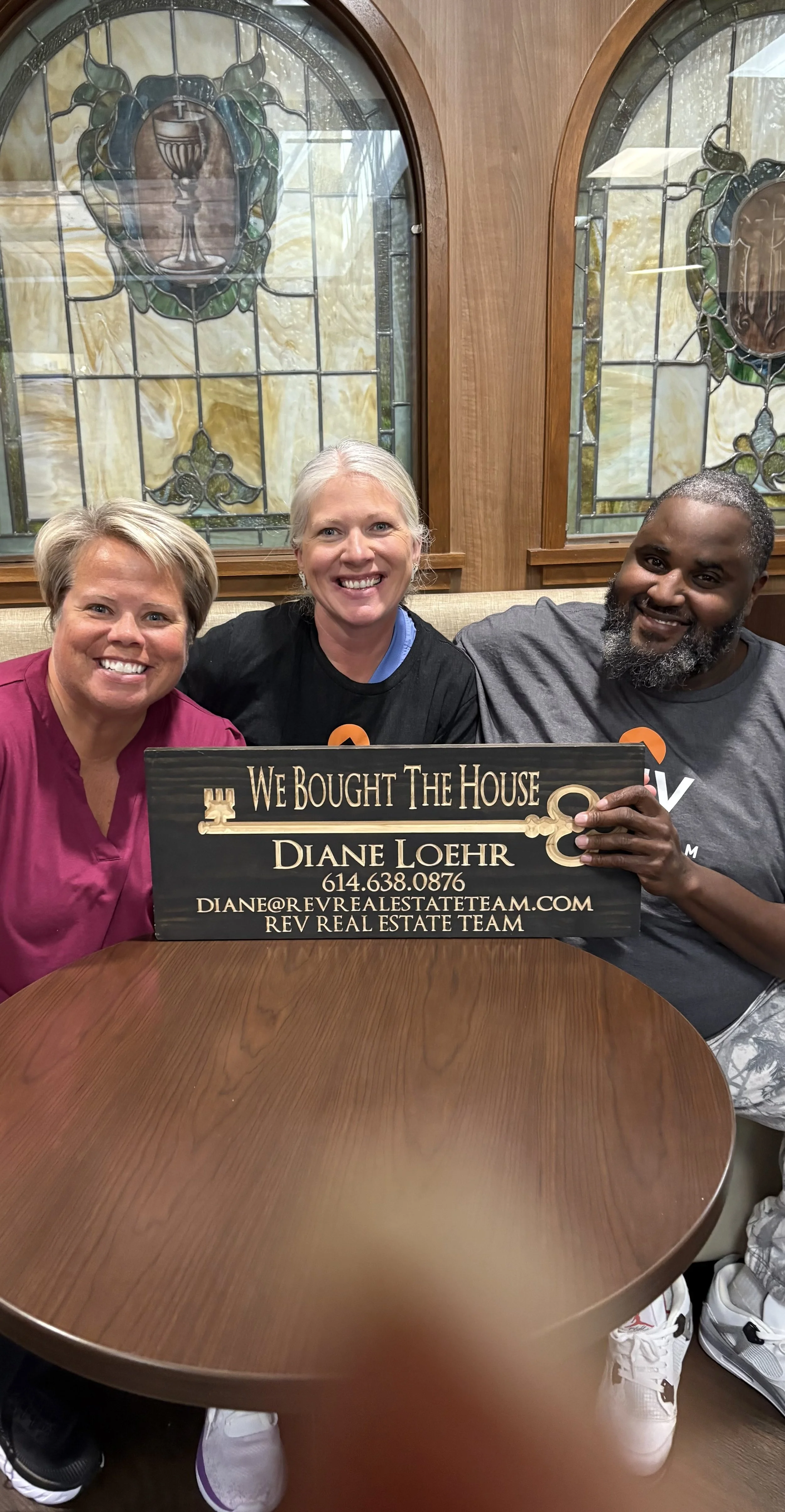 Diane Loehr, top real estate agent, helping clients close on a new home in Columbus, Ohio.