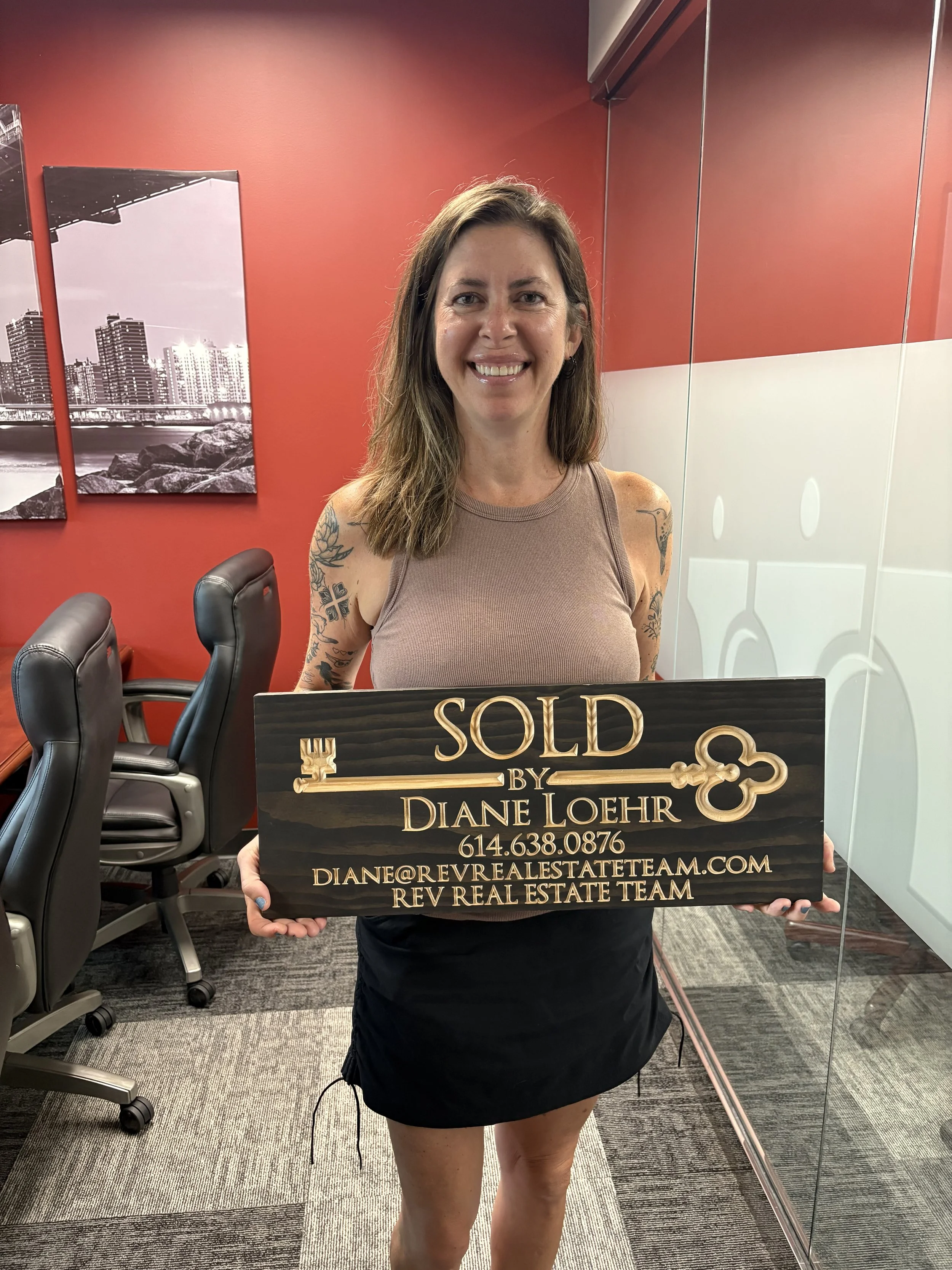 Finalizing a real estate transaction with trusted realtor Diane Loehr in Worthington, Ohio.