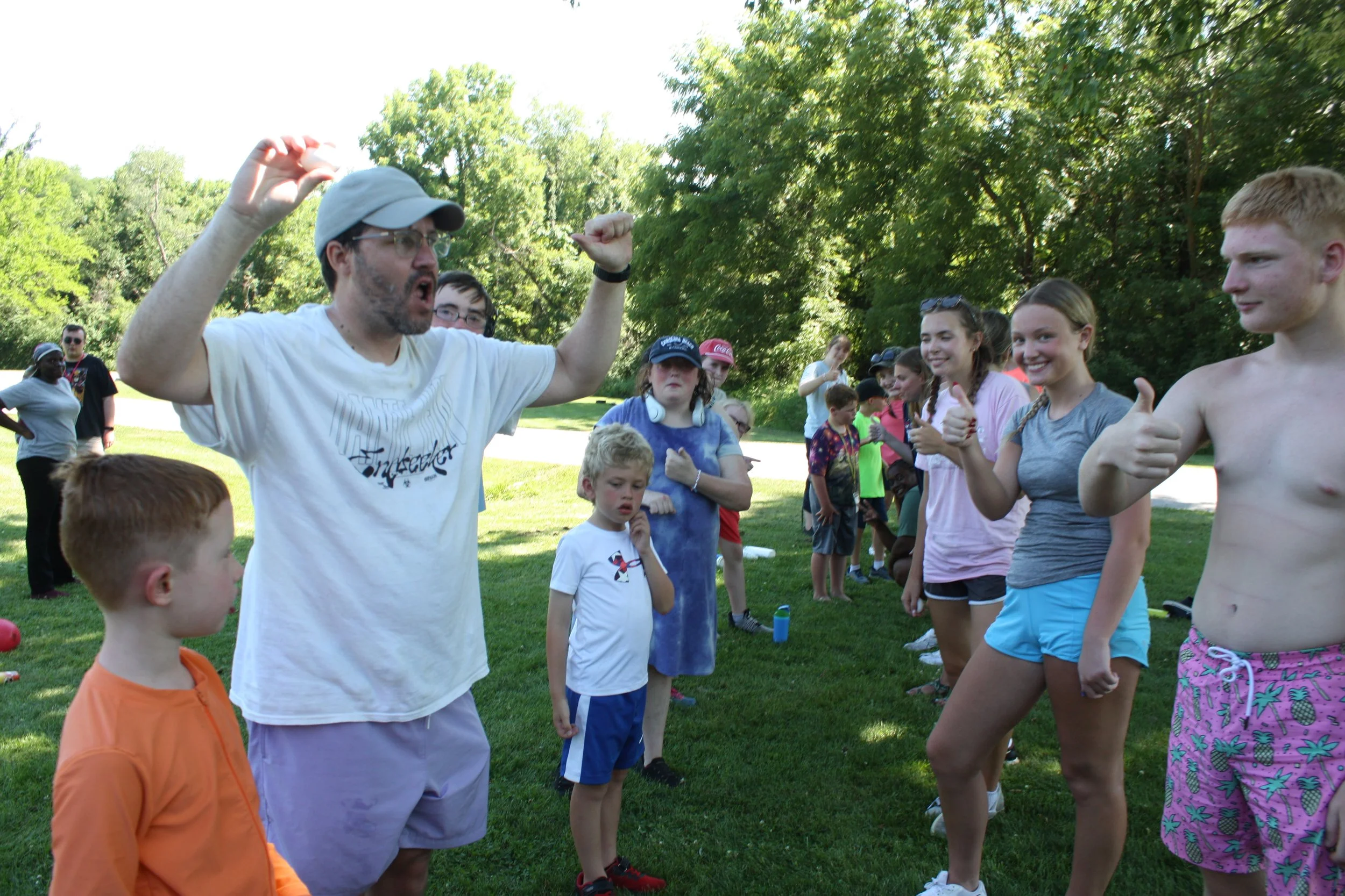 Tim celebrating with other campers