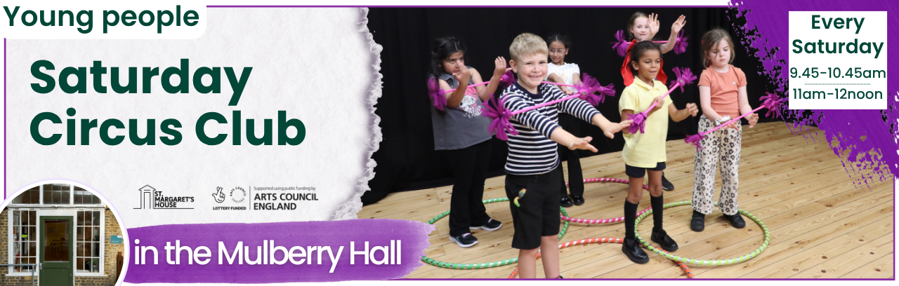 6 children playing with purple circus batons and multi-coloured hula-hoops on wooden floor with black backdrop.