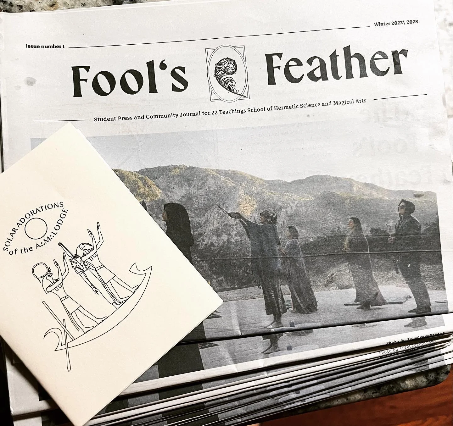 A copy of Fool's Feather, a student newspaper through 22 Teachings Natalie was the editor of back in 2022.