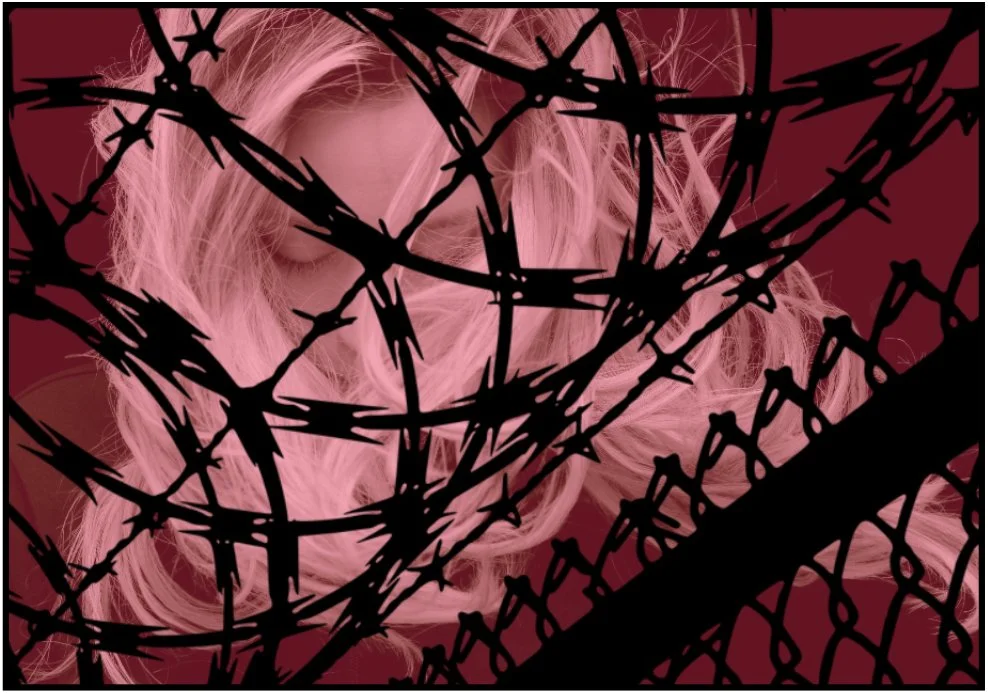 Portrayed against a dark red background, a young blonde woman's torso had eyes downcast, while in front loom the black outlines of a chain-link fence and curled razor wire.