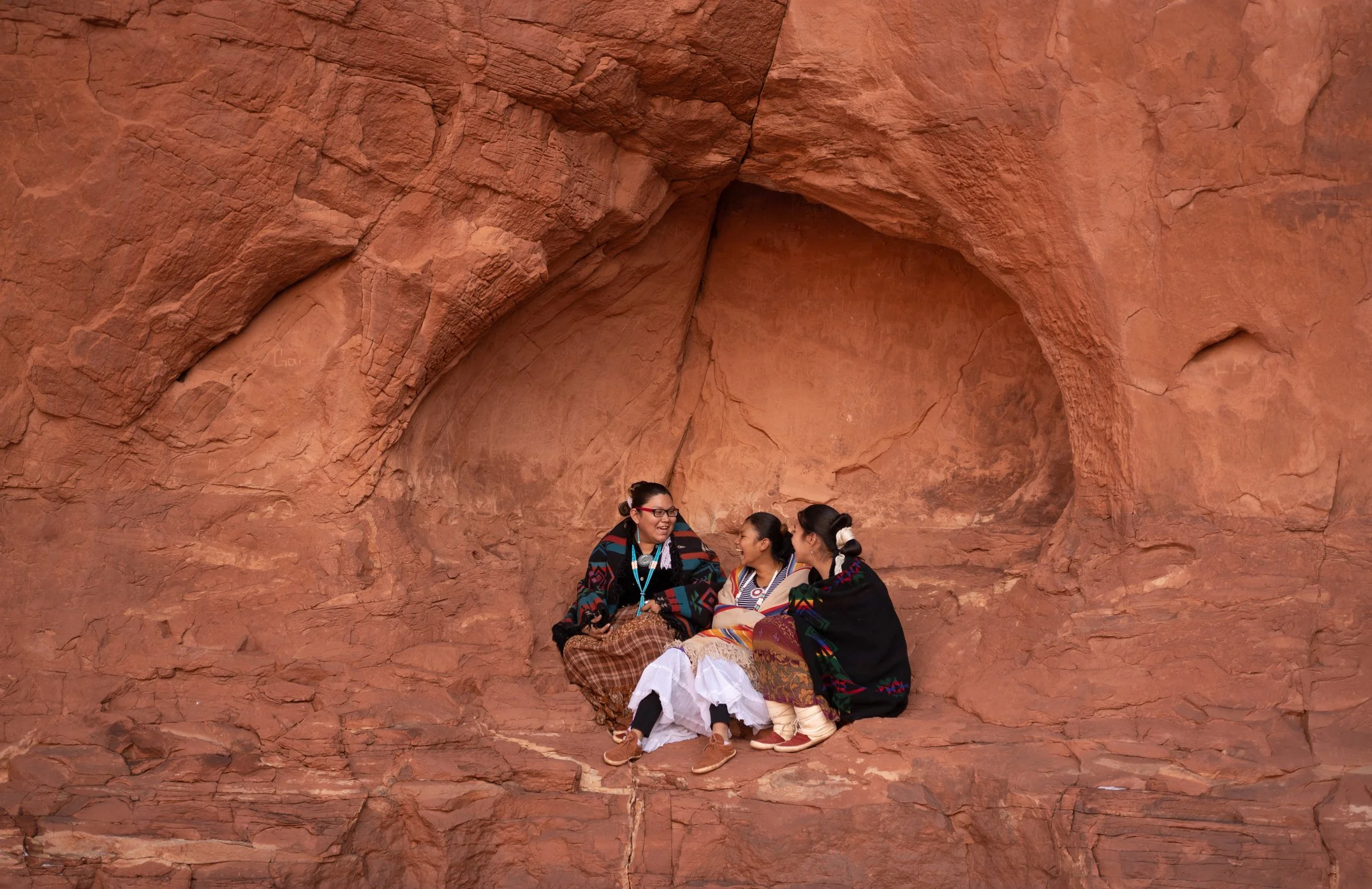 Women gathering and sharing stories. Credit The Palmer