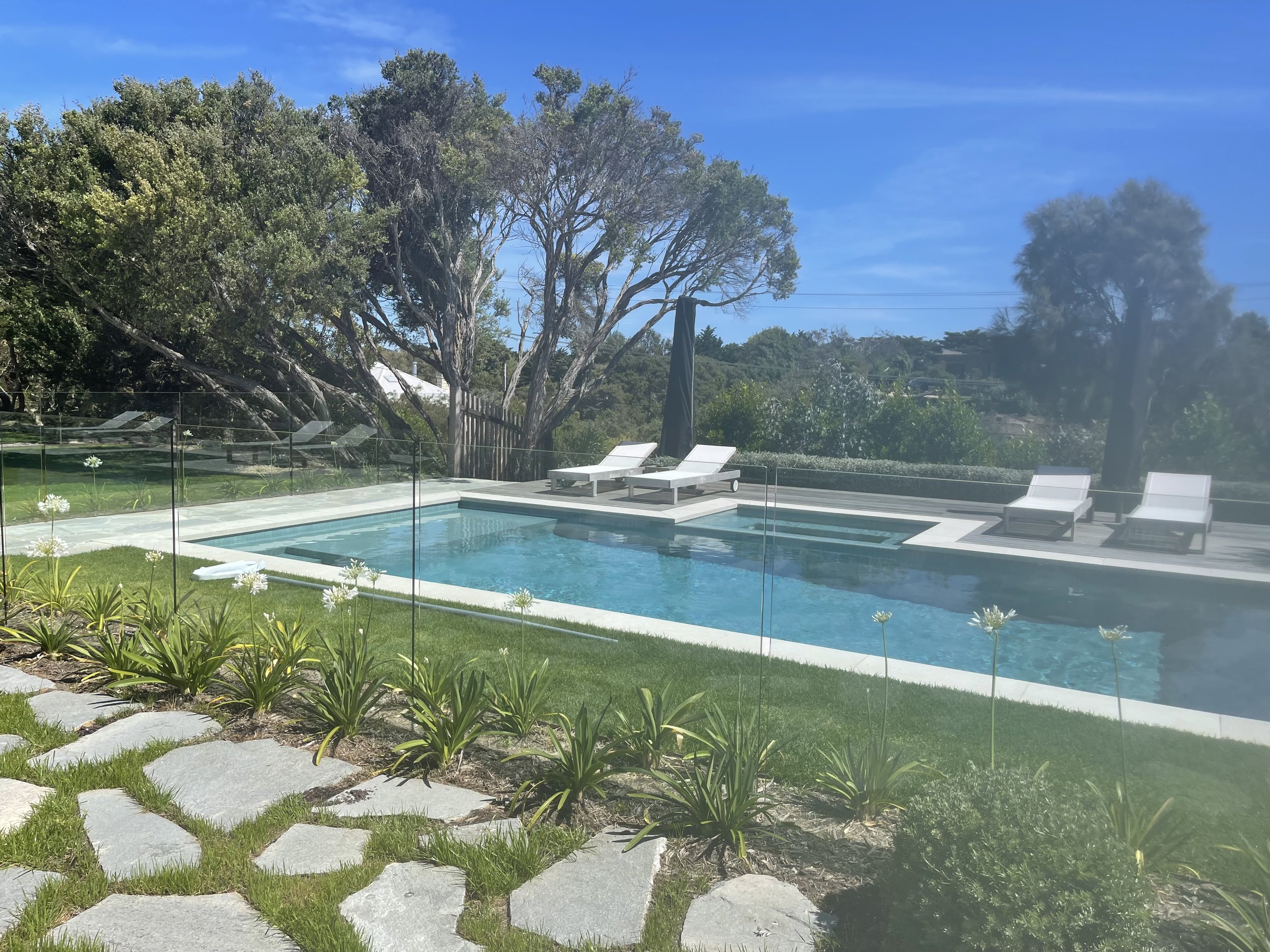 The glass panels in this pool area were cleaned to excellence by Vis a Vis Window Cleaning.