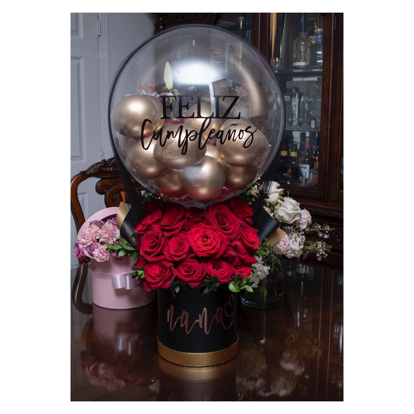 Red roses flower box air balloon arrangement: $280+