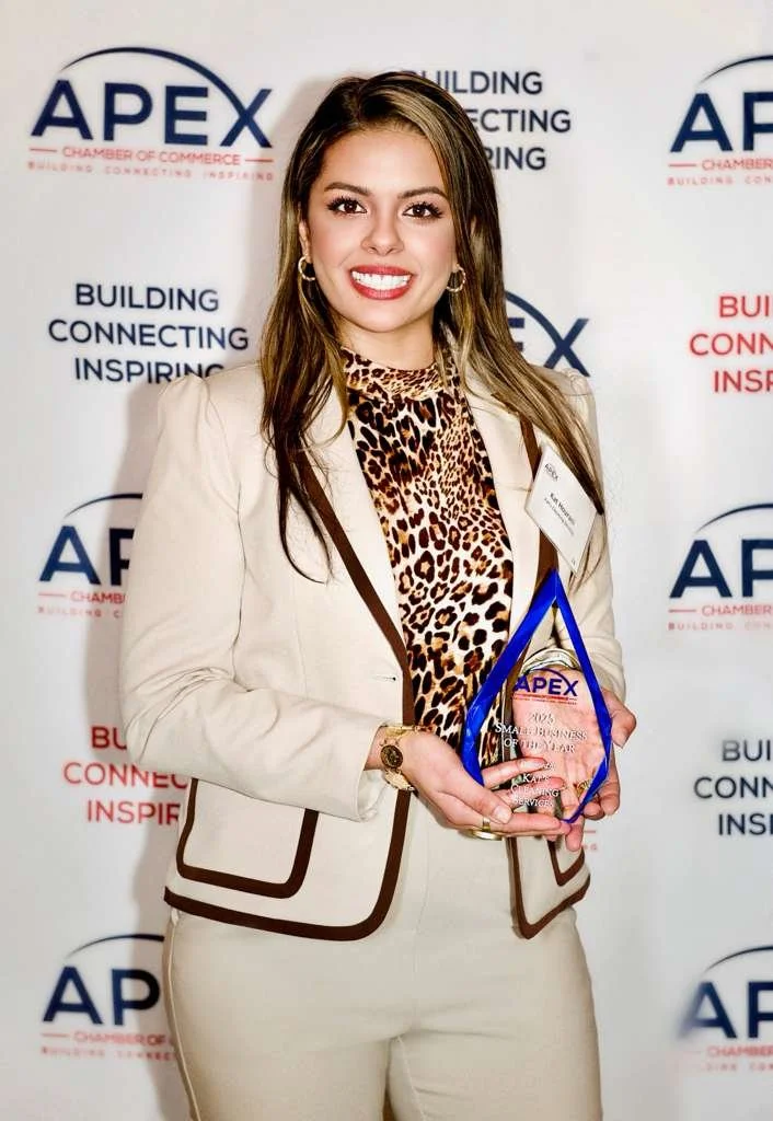 Kats pic with apex trophy .jpg