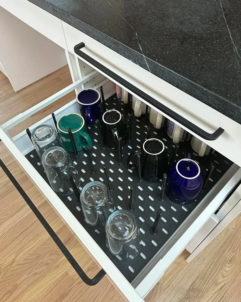 Glasses, mugs can all fit in the drawers.