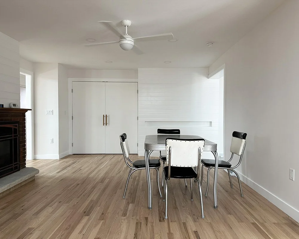 Originally the dining room, but we think it could make a pretty good seating area, too. There's a ramp along the panel wall.